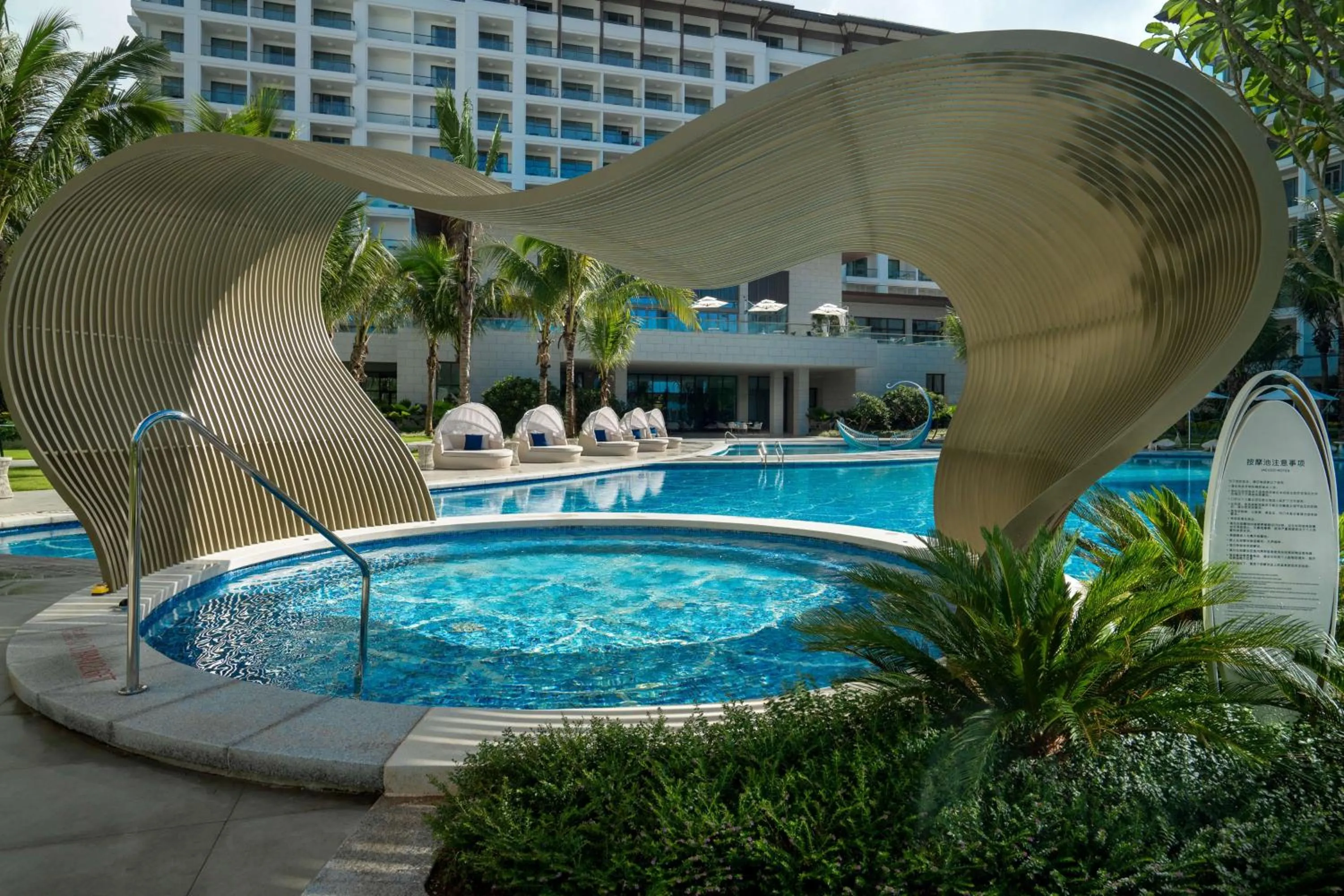 Pool view in The Mermoon Resort Hainan Tufu Bay, Tapestry By Hilton