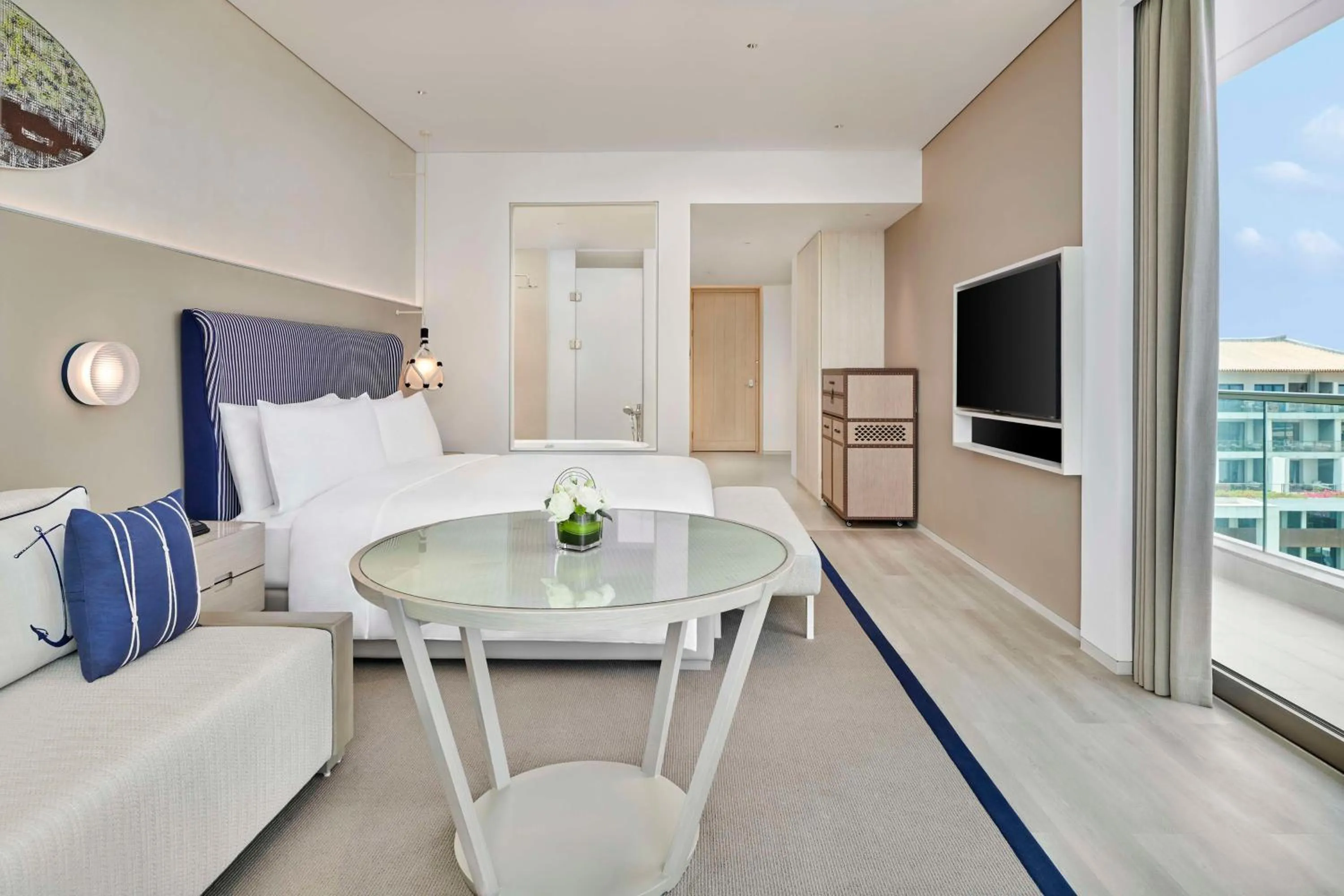 Living room in The Mermoon Resort Hainan Tufu Bay, Tapestry By Hilton