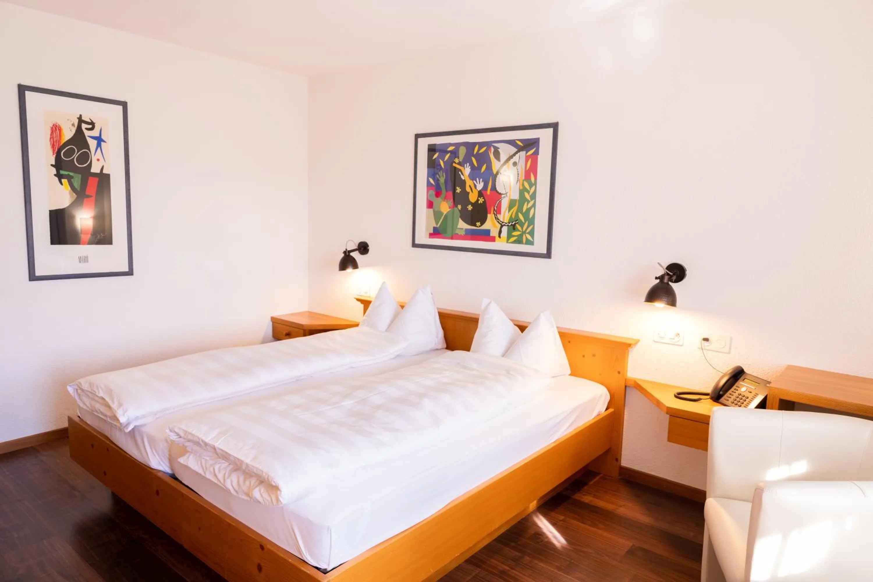 Bed in Hotel Schatzmann