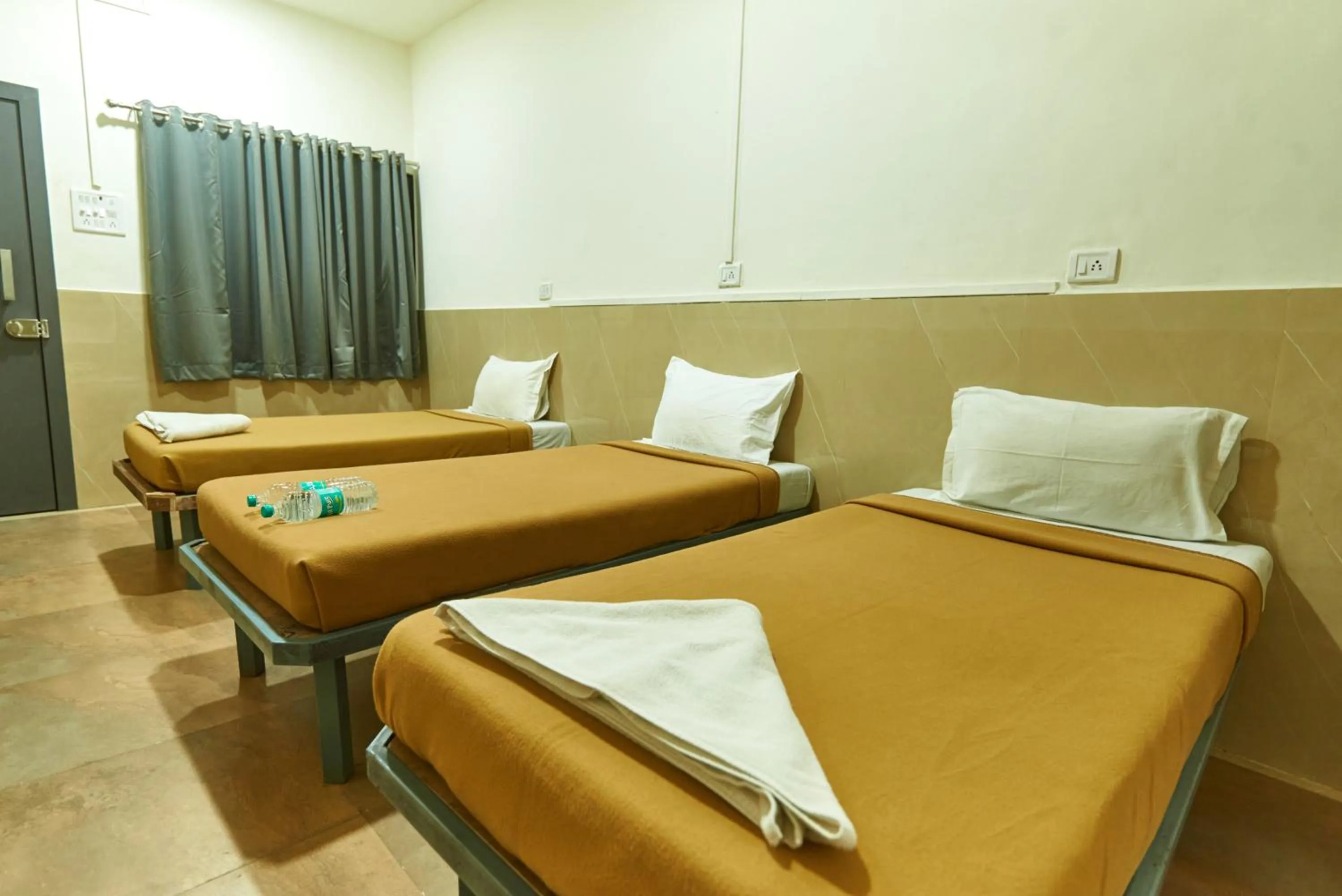 Photo of the whole room in Hotel Sai Palkhi Niwara