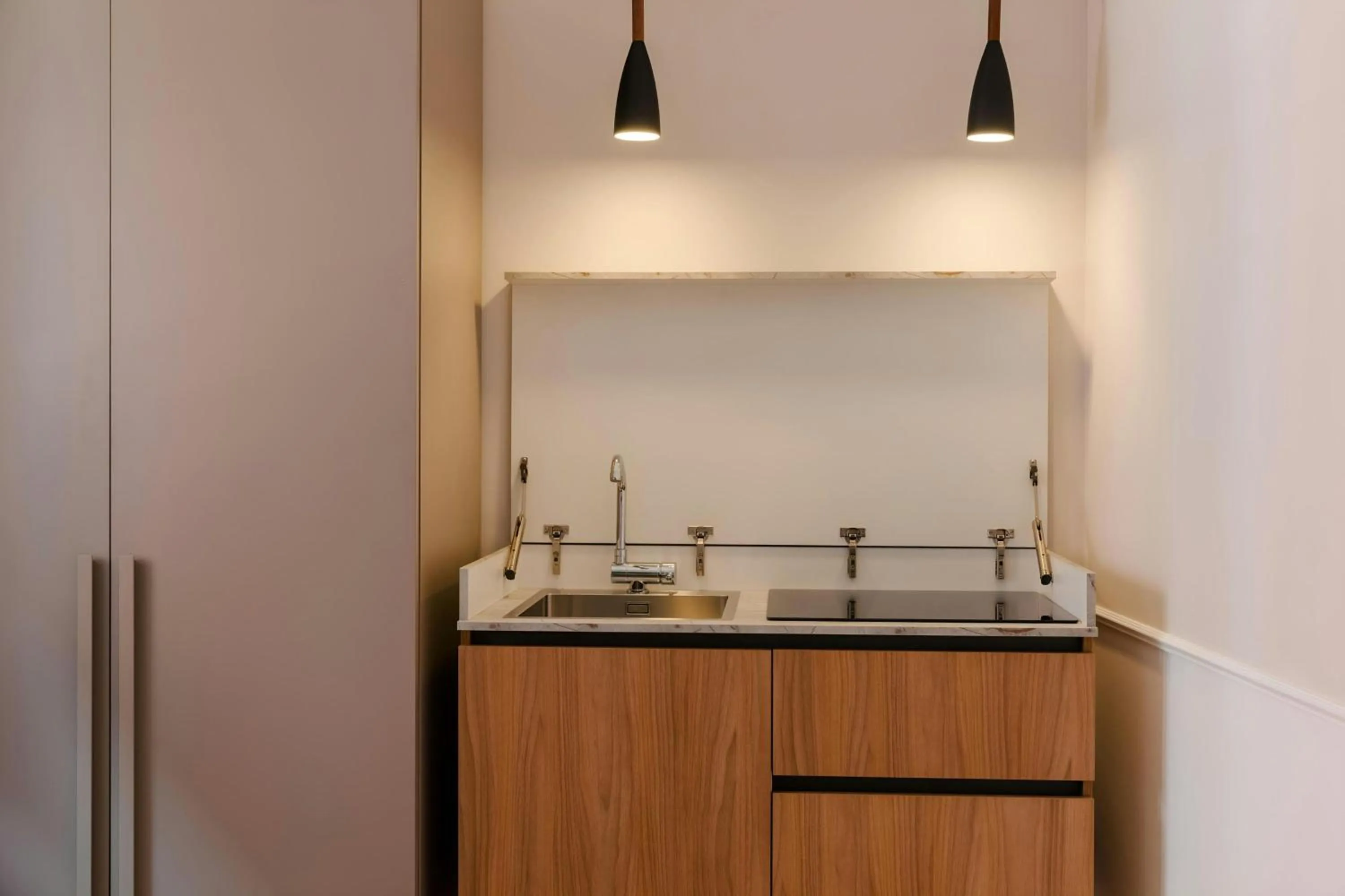 Kitchen or kitchenette in Sonder by Marriott Bonvoy Antinoo Apartments Piazza del Parlamento