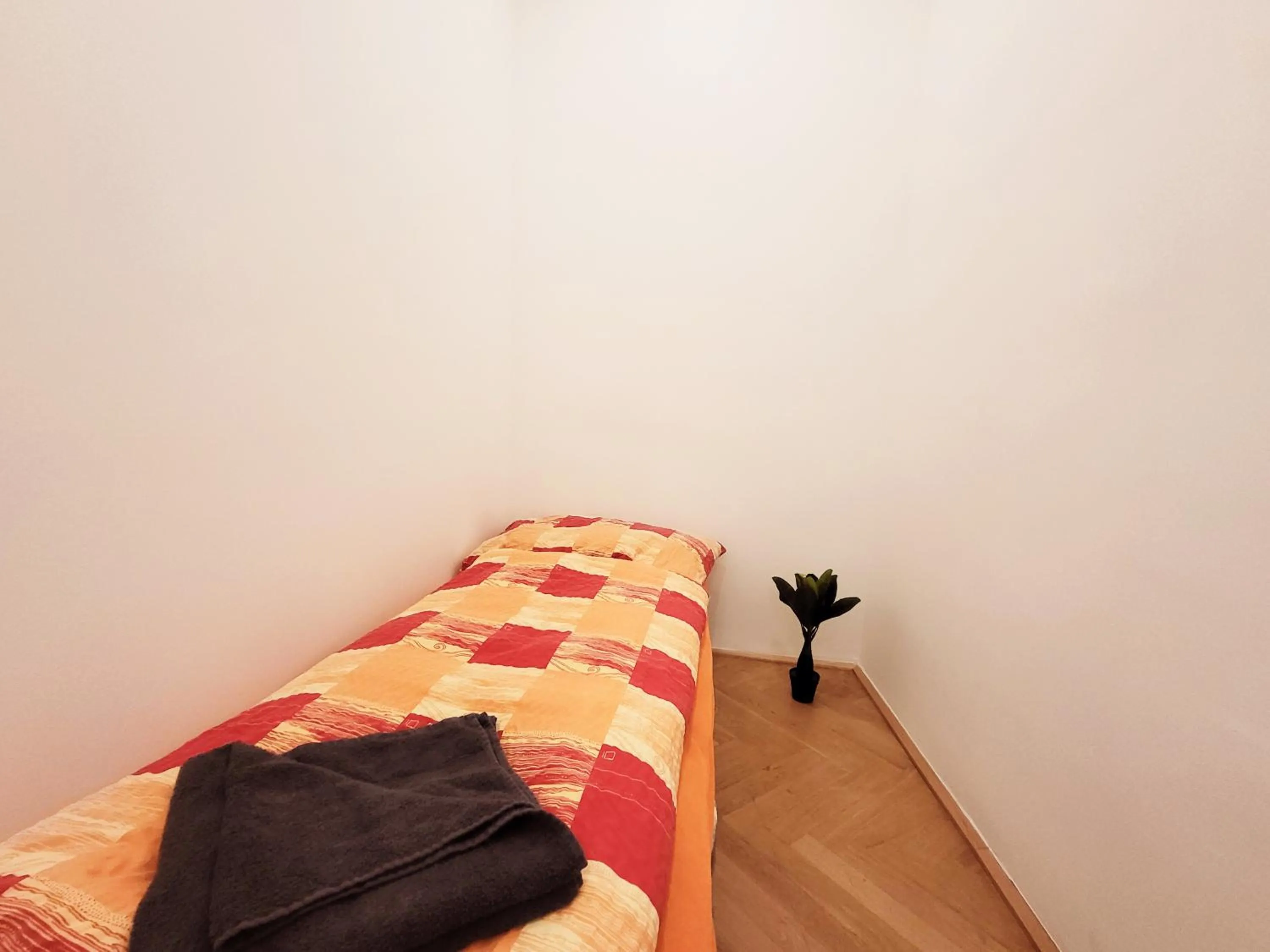 Bed in Donaufelder City Apartment