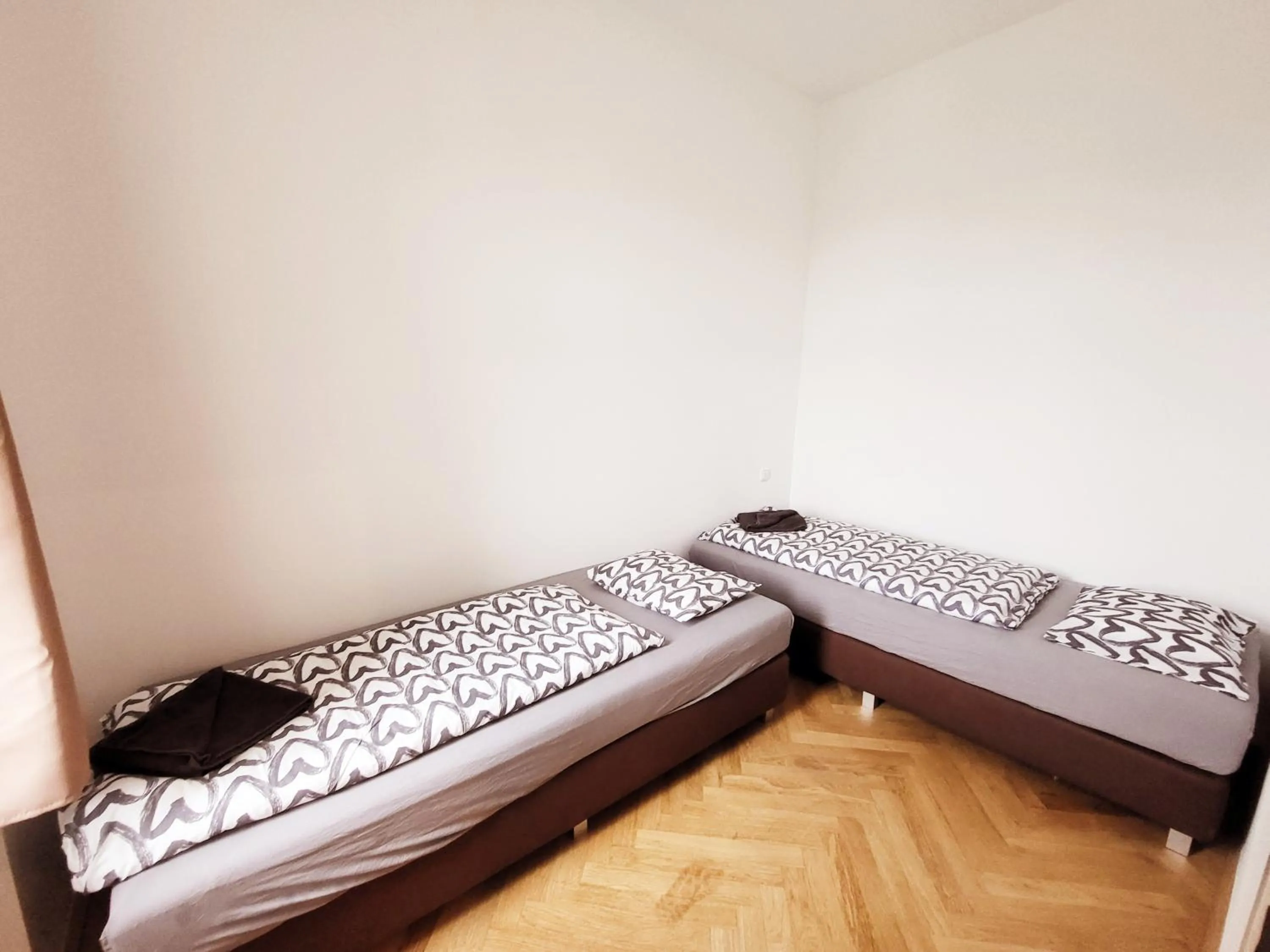 Bed in Donaufelder City Apartment