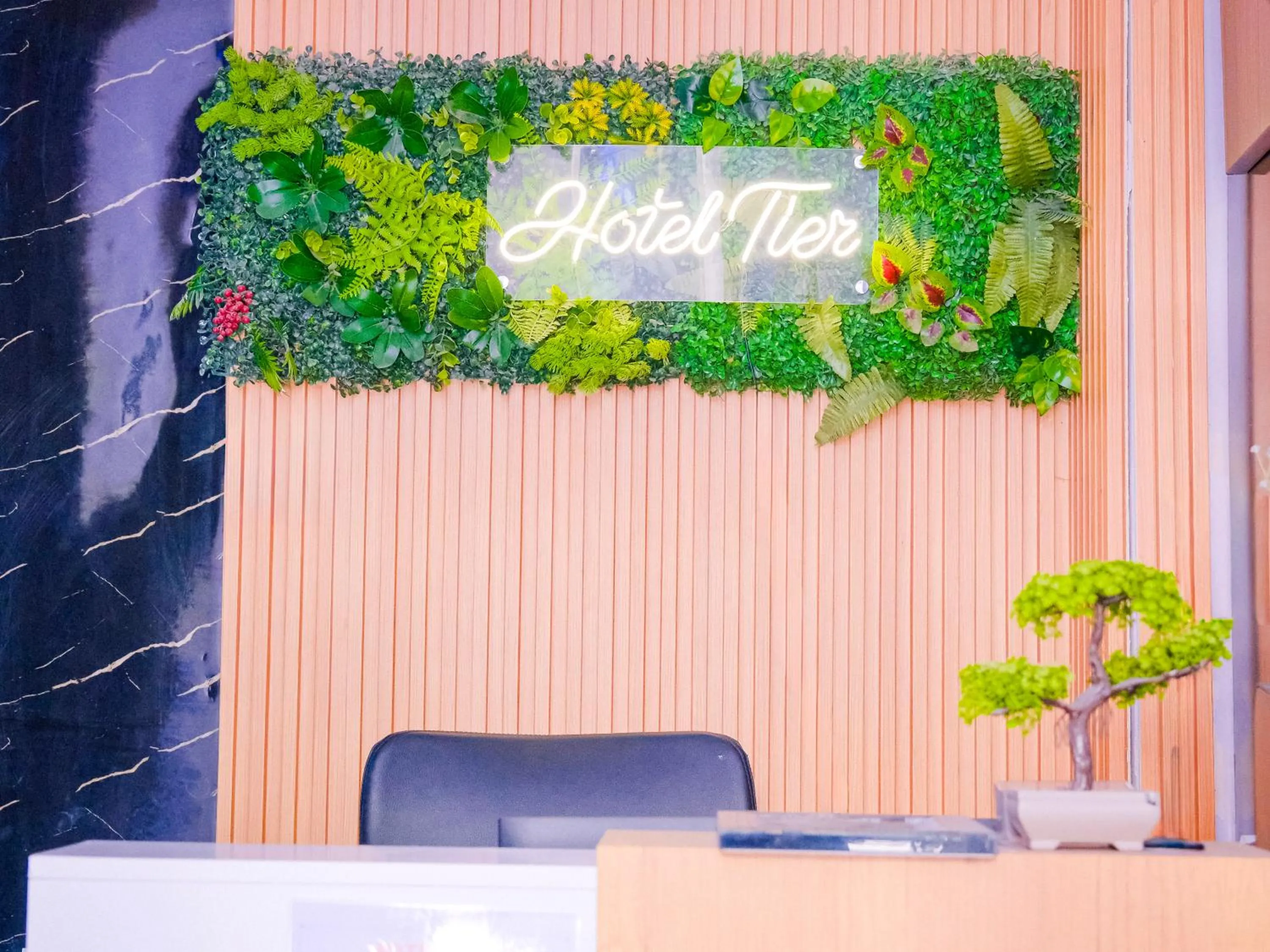 Property logo or sign in Hotel Tier Center