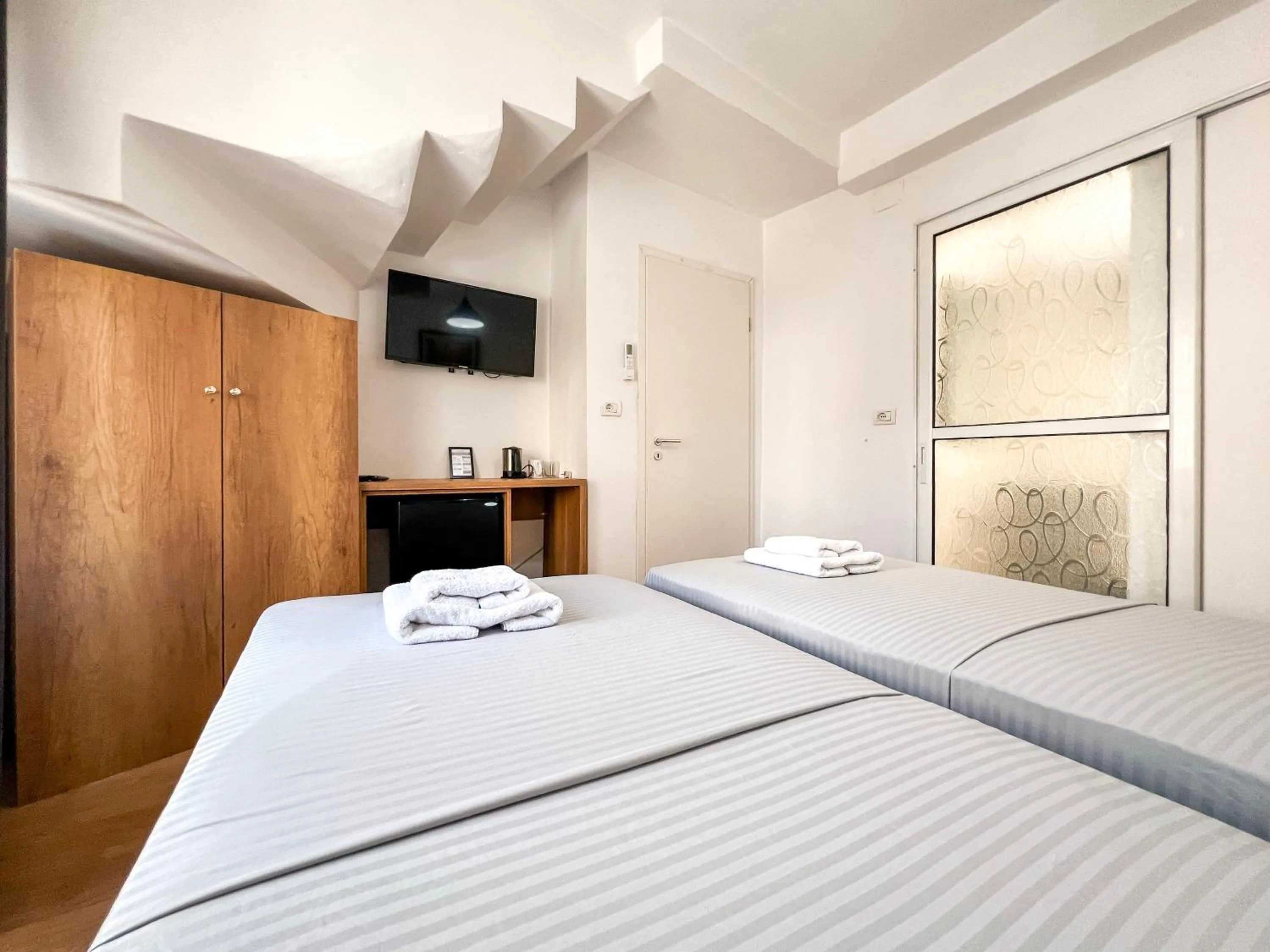 Bed in Hotel Tier Center