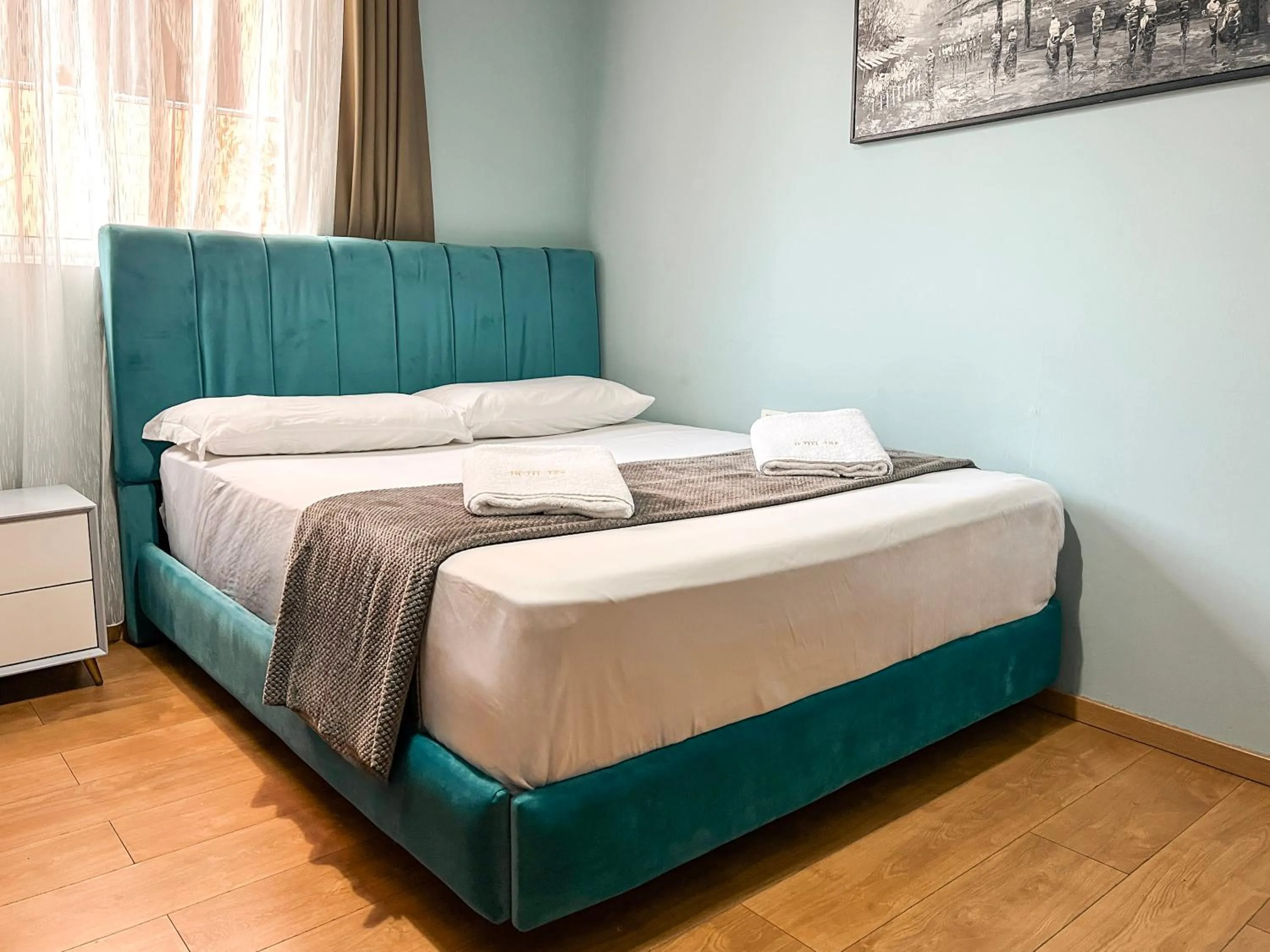 Bed in Hotel Tier Center