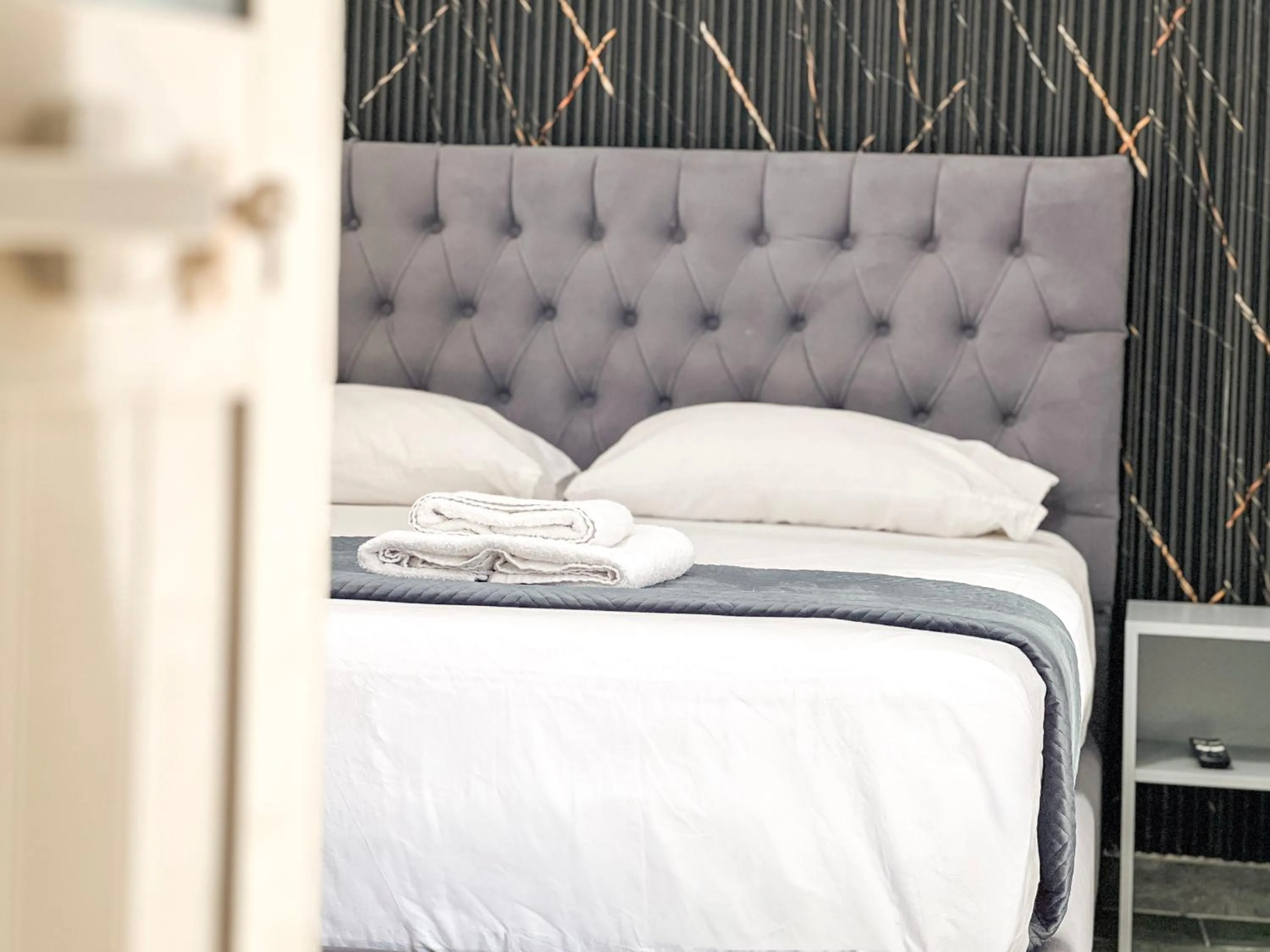 Bed in Hotel Tier Center