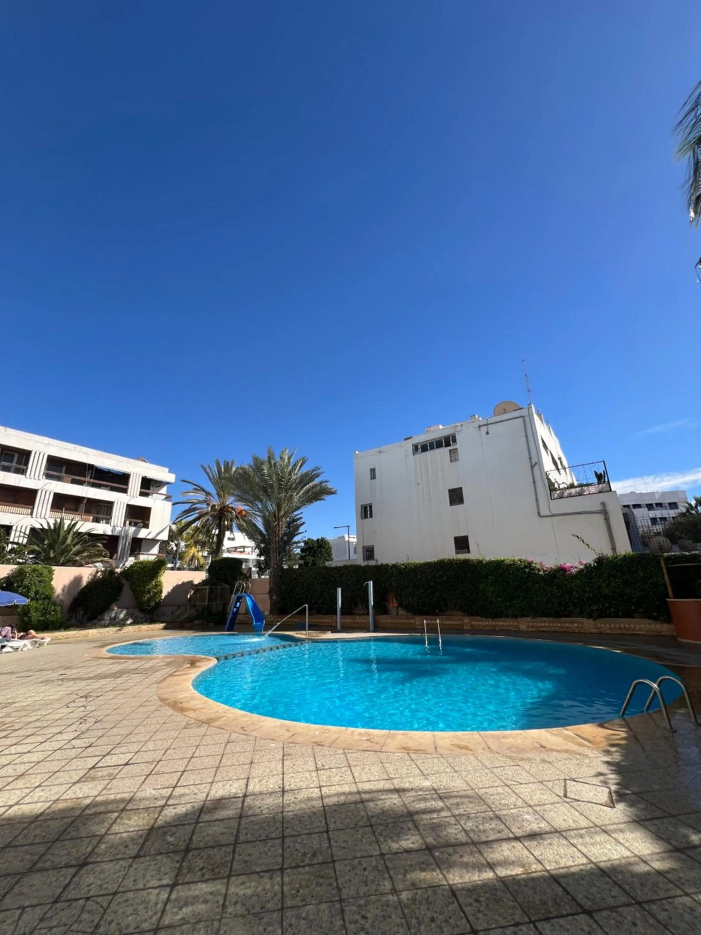 Swimming pool in Hôtel Résidence Louban