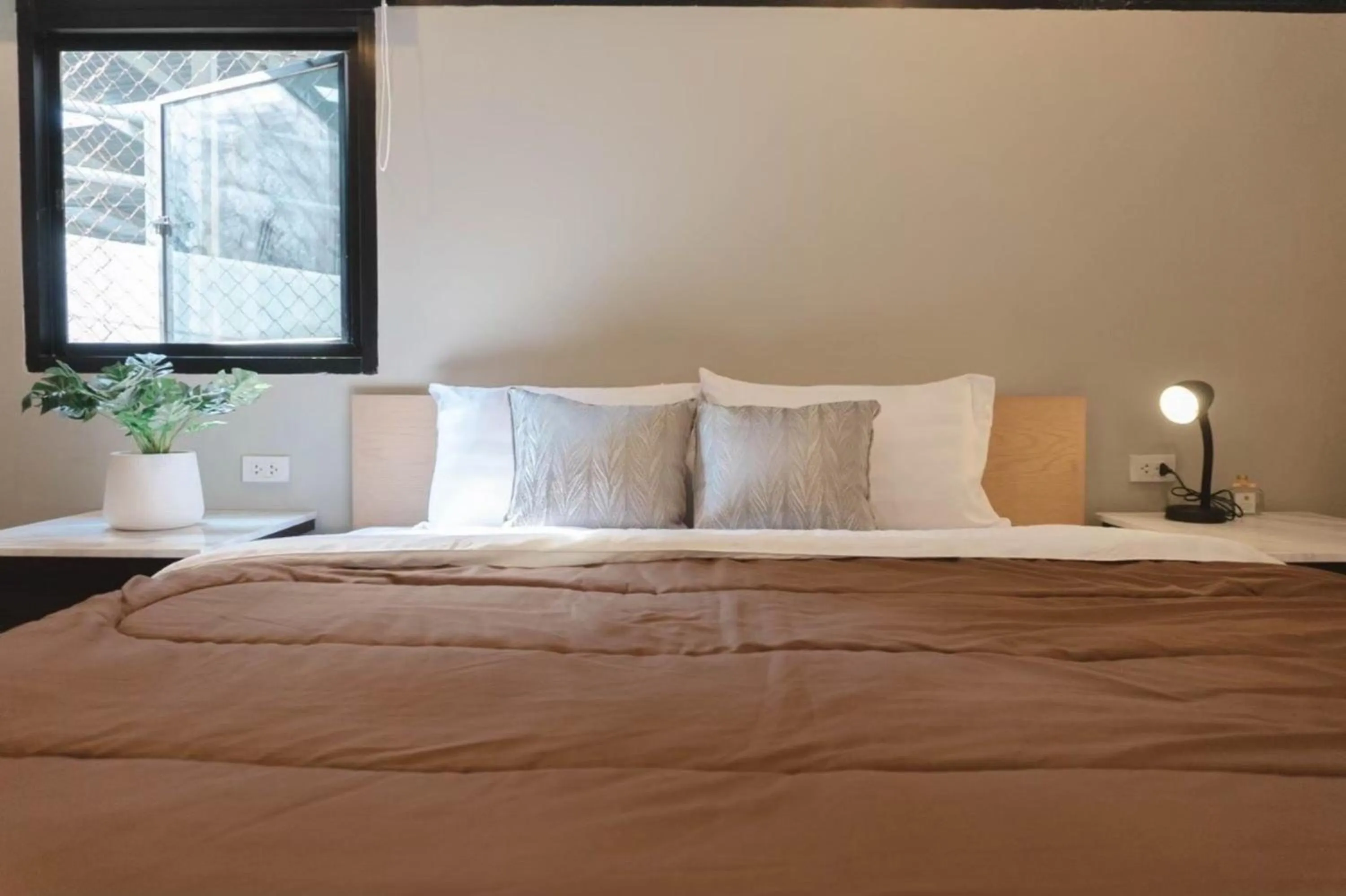 Bed in BnB98 Silom Hotel