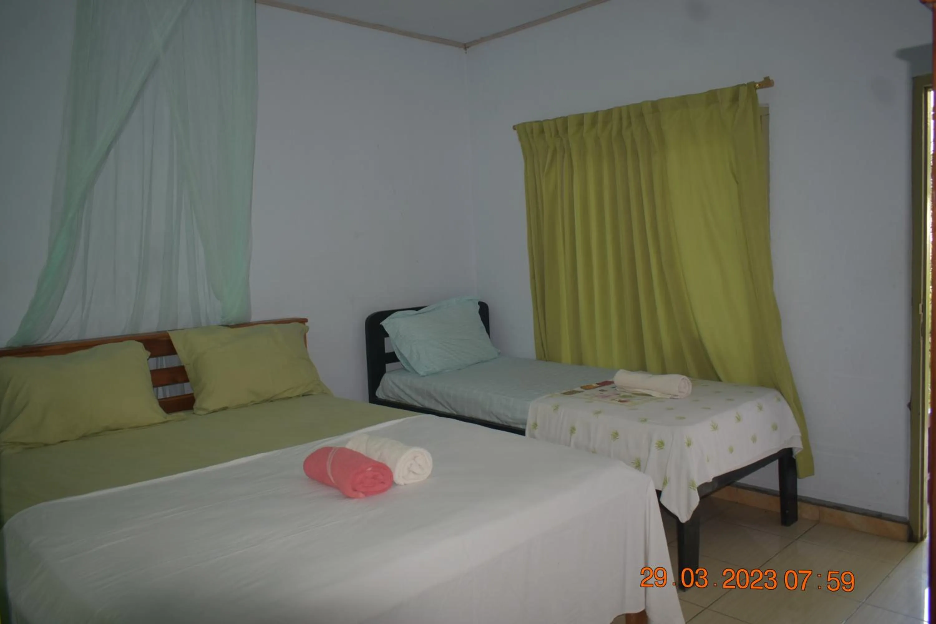 Bed in Del Mar Home Stay