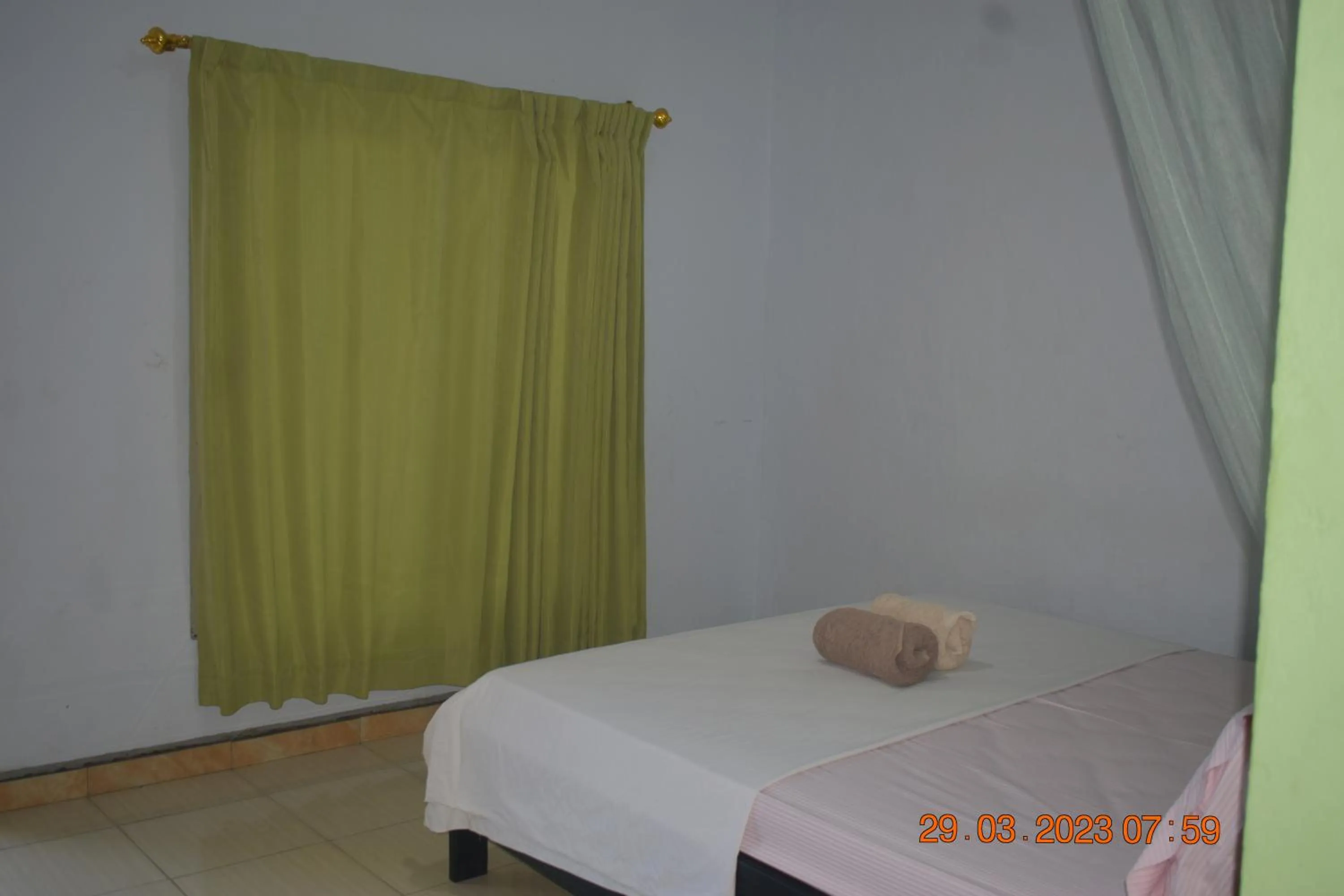 Bed in Del Mar Home Stay