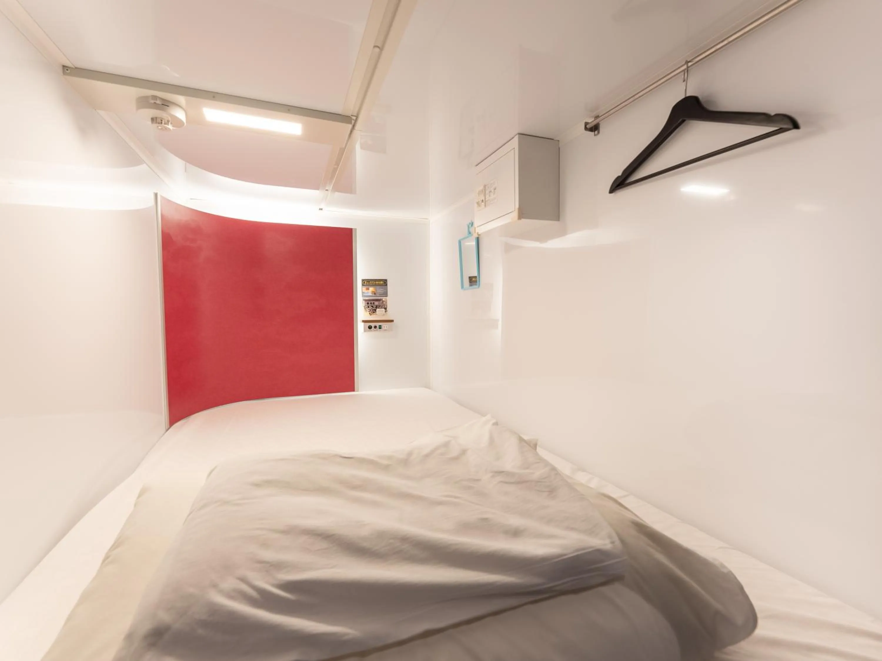 Photo of the whole room, Bed in Tabist MAYUDAMA CABIN