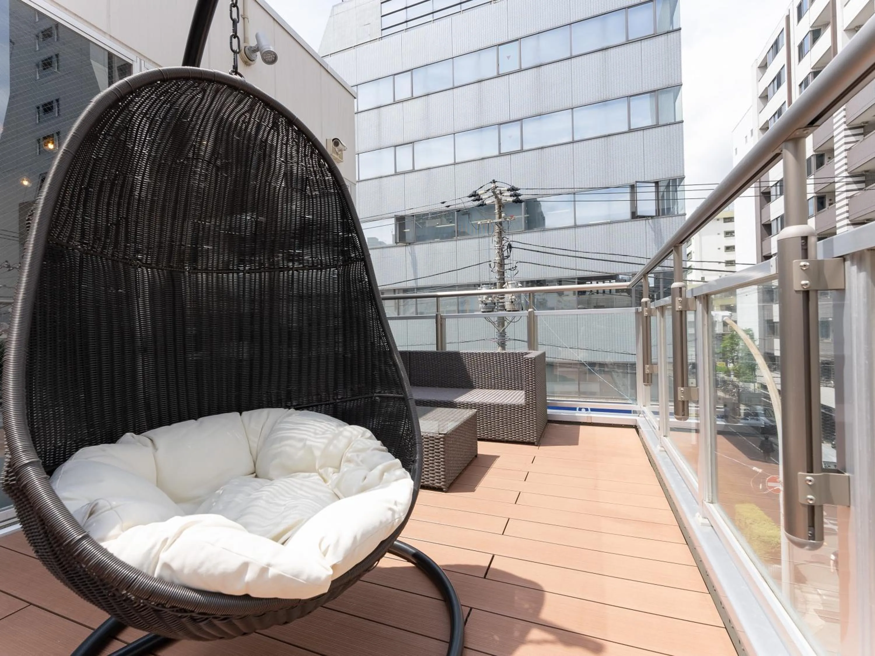 Communal lounge/ TV room in Tabist MAYUDAMA CABIN