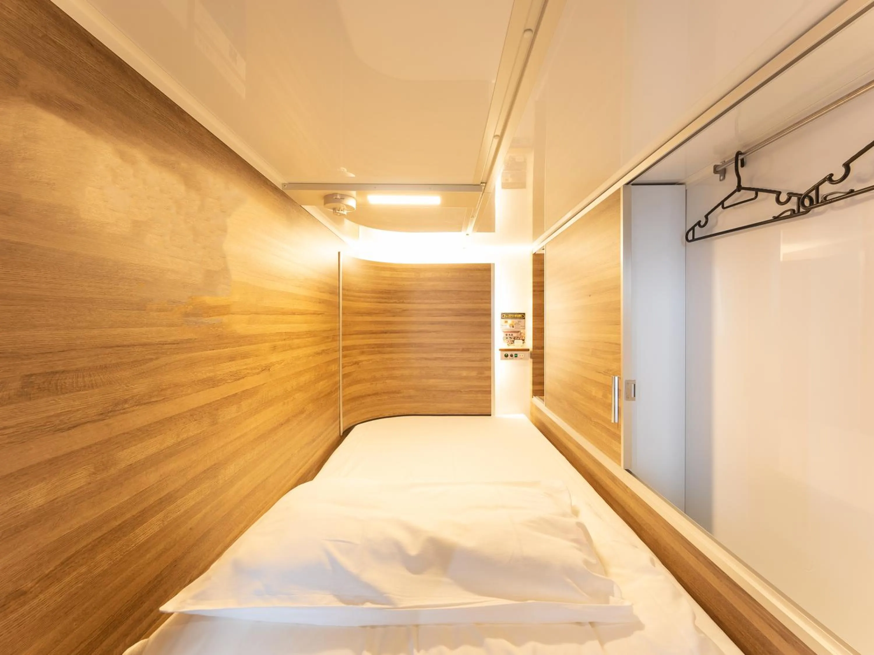 Photo of the whole room, Bed in Tabist MAYUDAMA CABIN