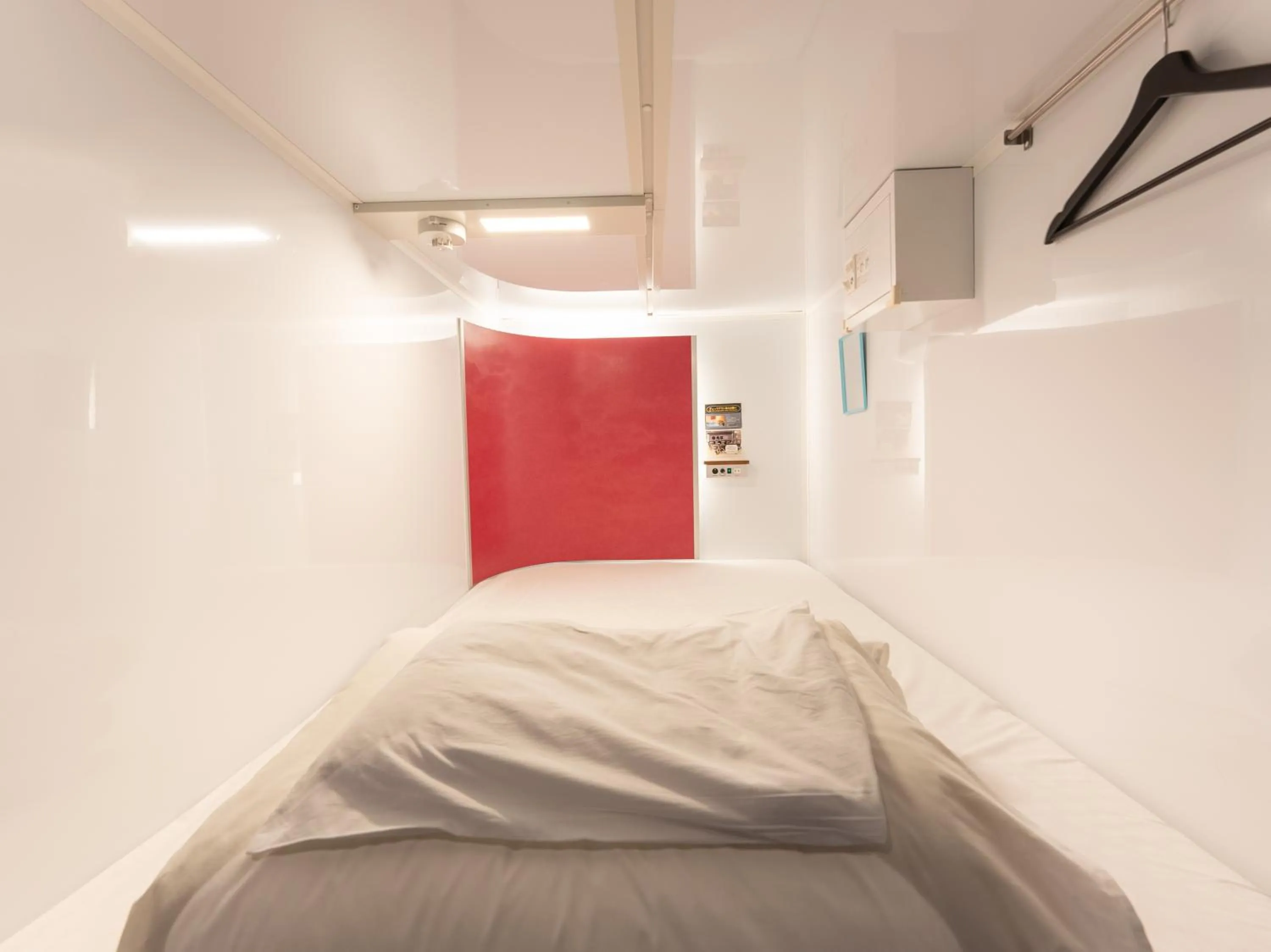 Photo of the whole room, Bed in Tabist MAYUDAMA CABIN