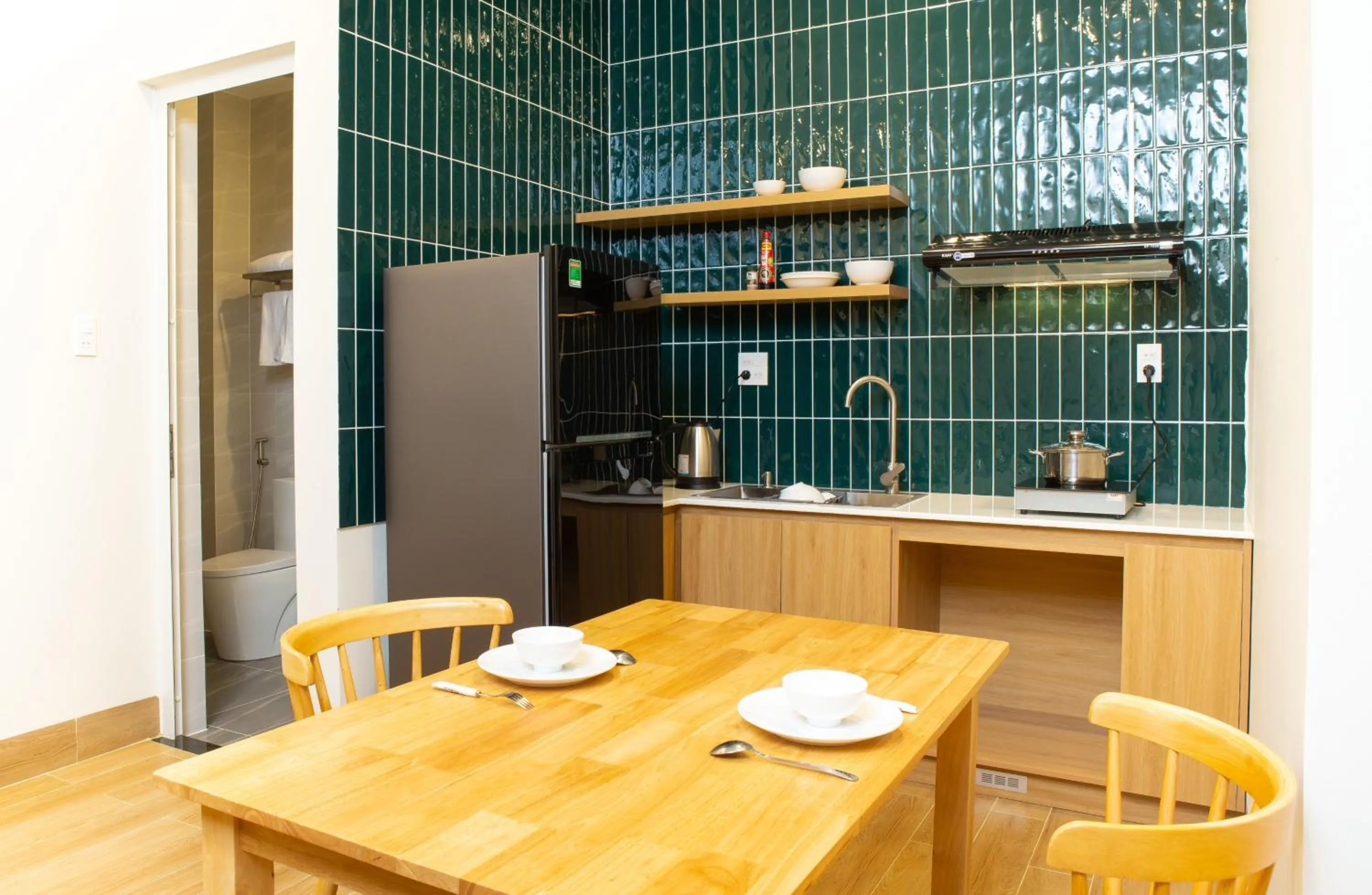 Kitchen or kitchenette in Vy's House Phanthiet Hotel