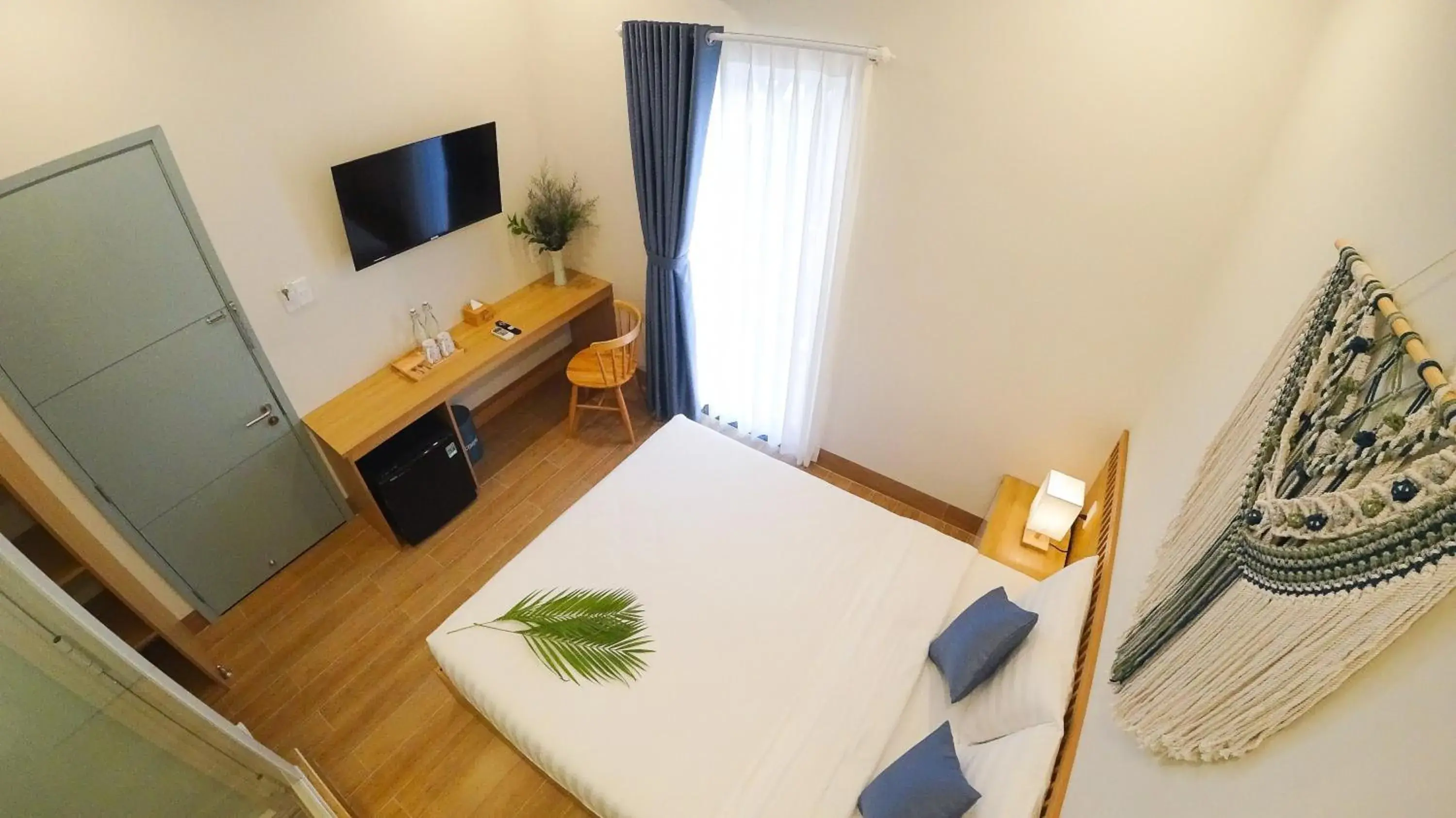 Photo of the whole room, Bed in Vy's House Phanthiet Hotel Photo of the whole room, Bed in Vy's House Phanthiet Hotel