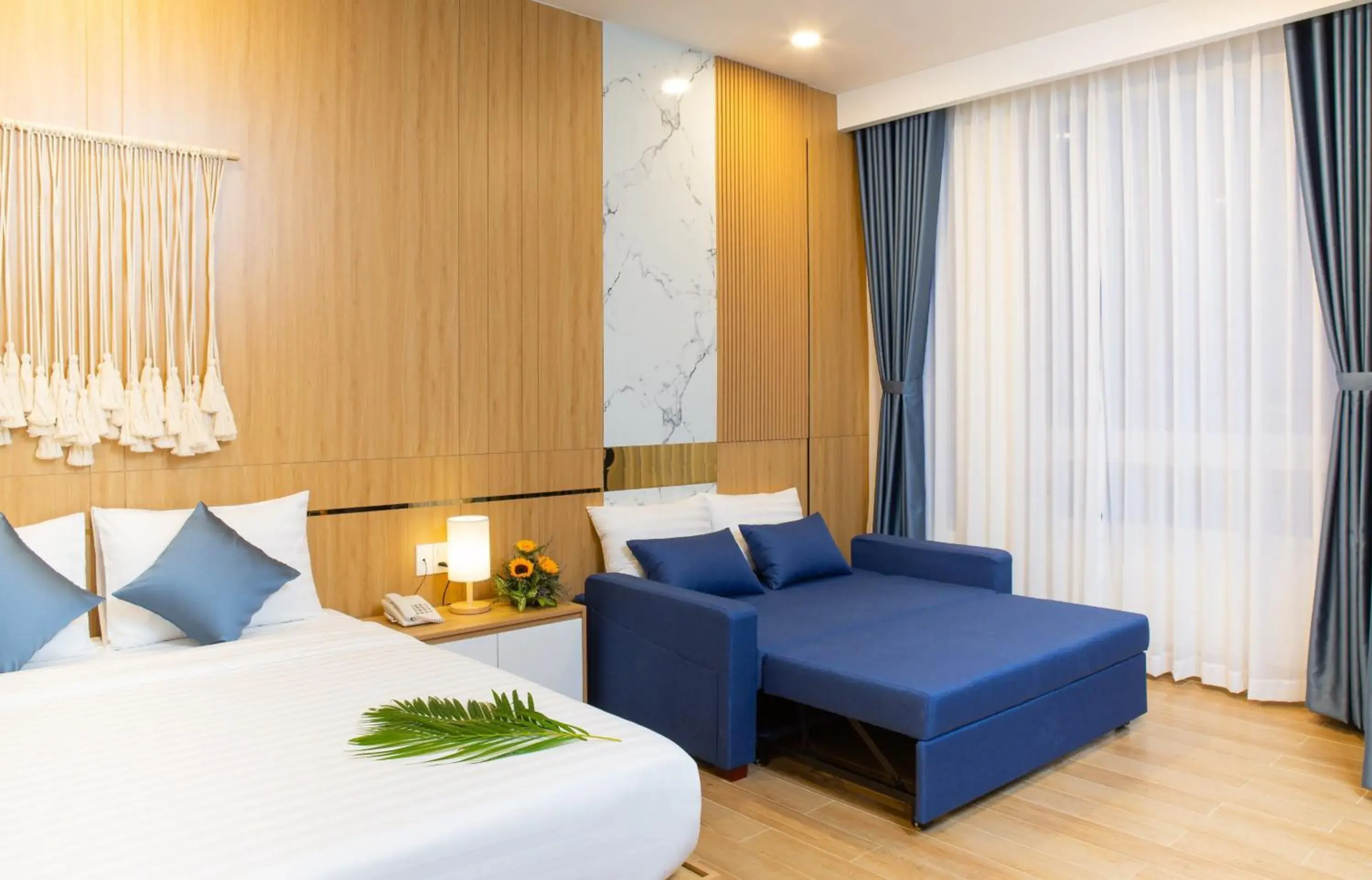 Bed in Vy's House Phanthiet Hotel Bed in Vy's House Phanthiet Hotel