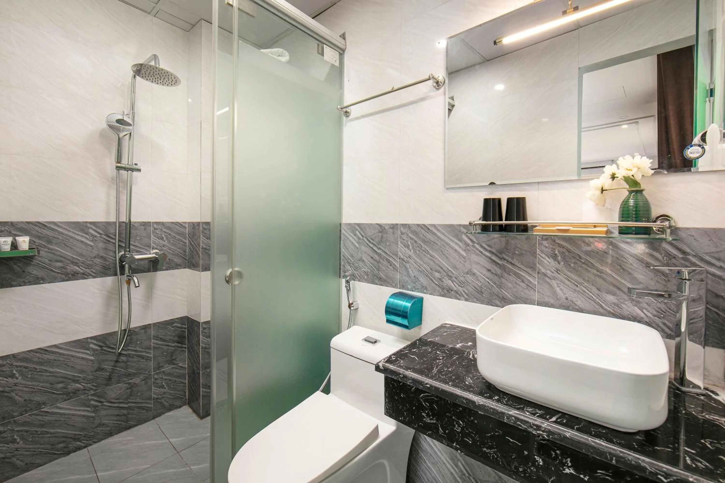 Shower in TrangTrang Classy Hotel