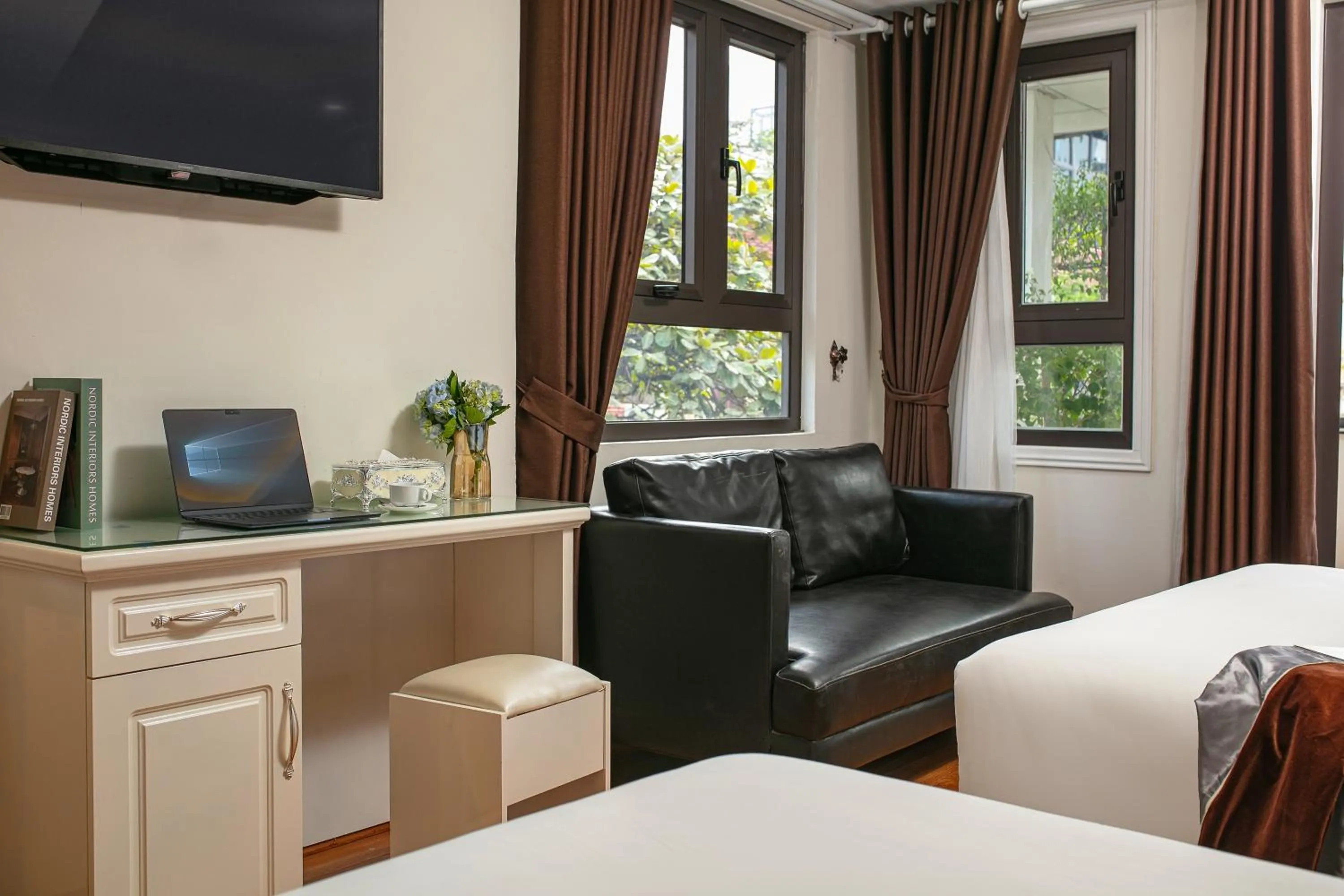 TV and multimedia, Bed in TrangTrang Classy Hotel