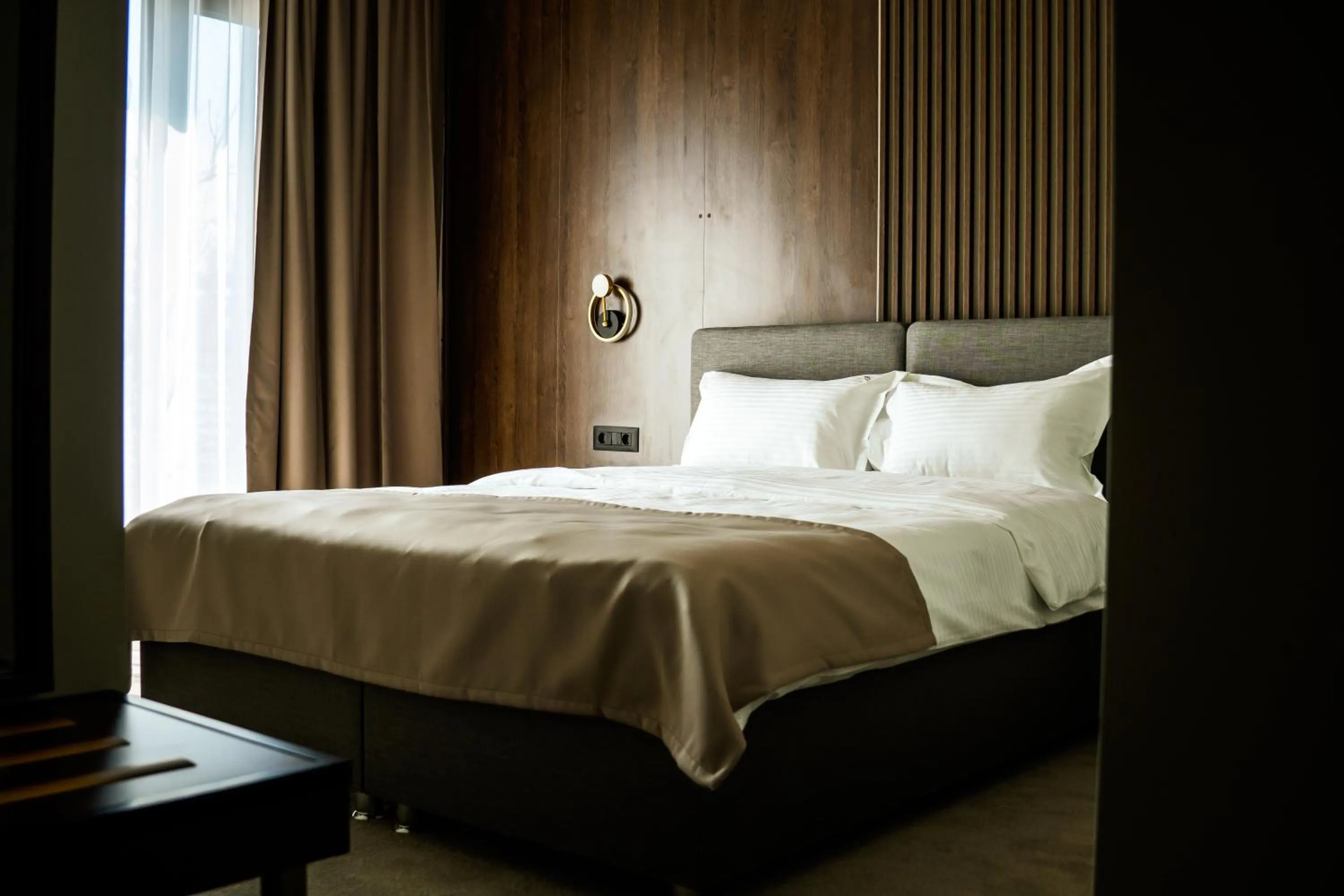 Bed in Sonio Boutique Hotel