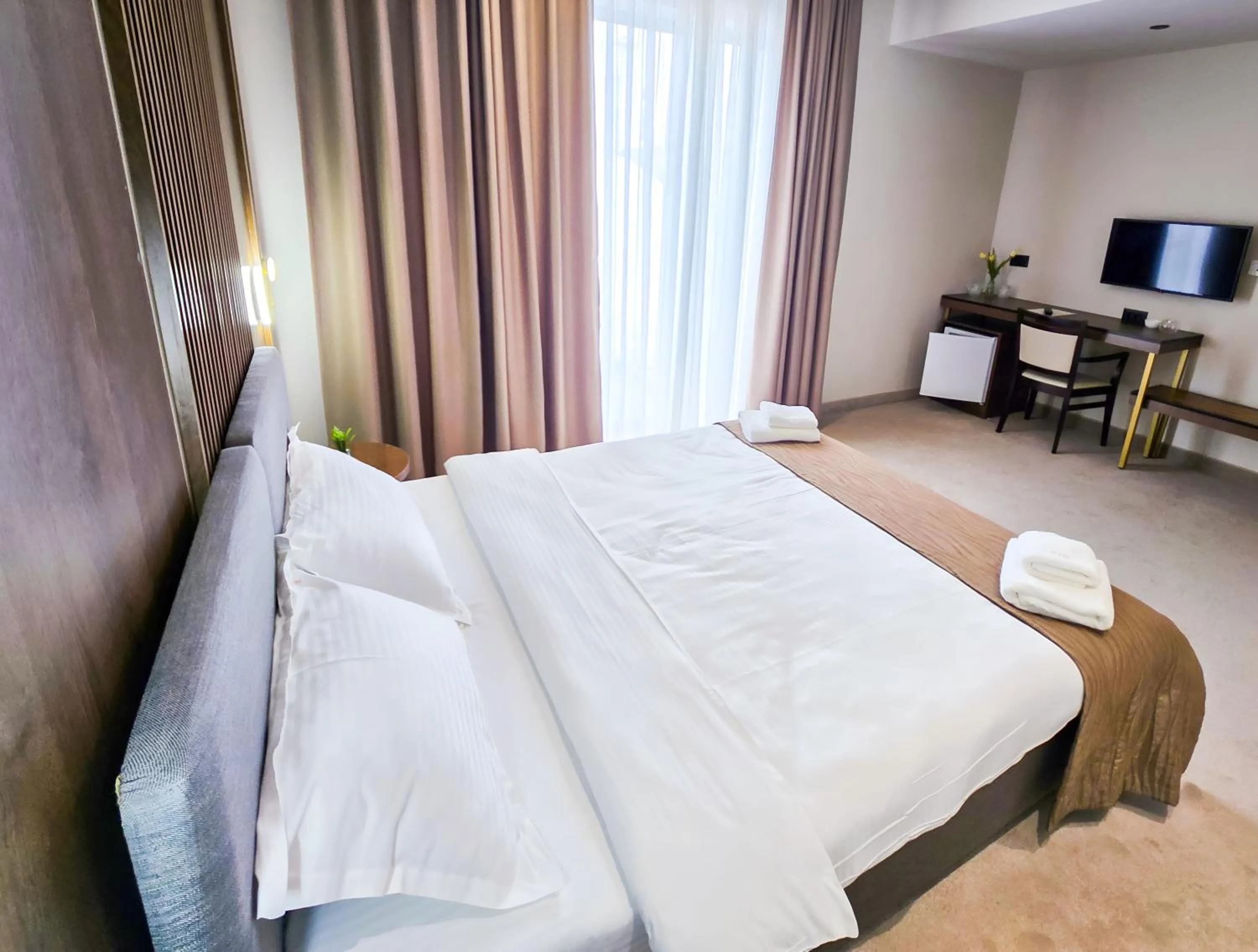 Bed in Sonio Boutique Hotel