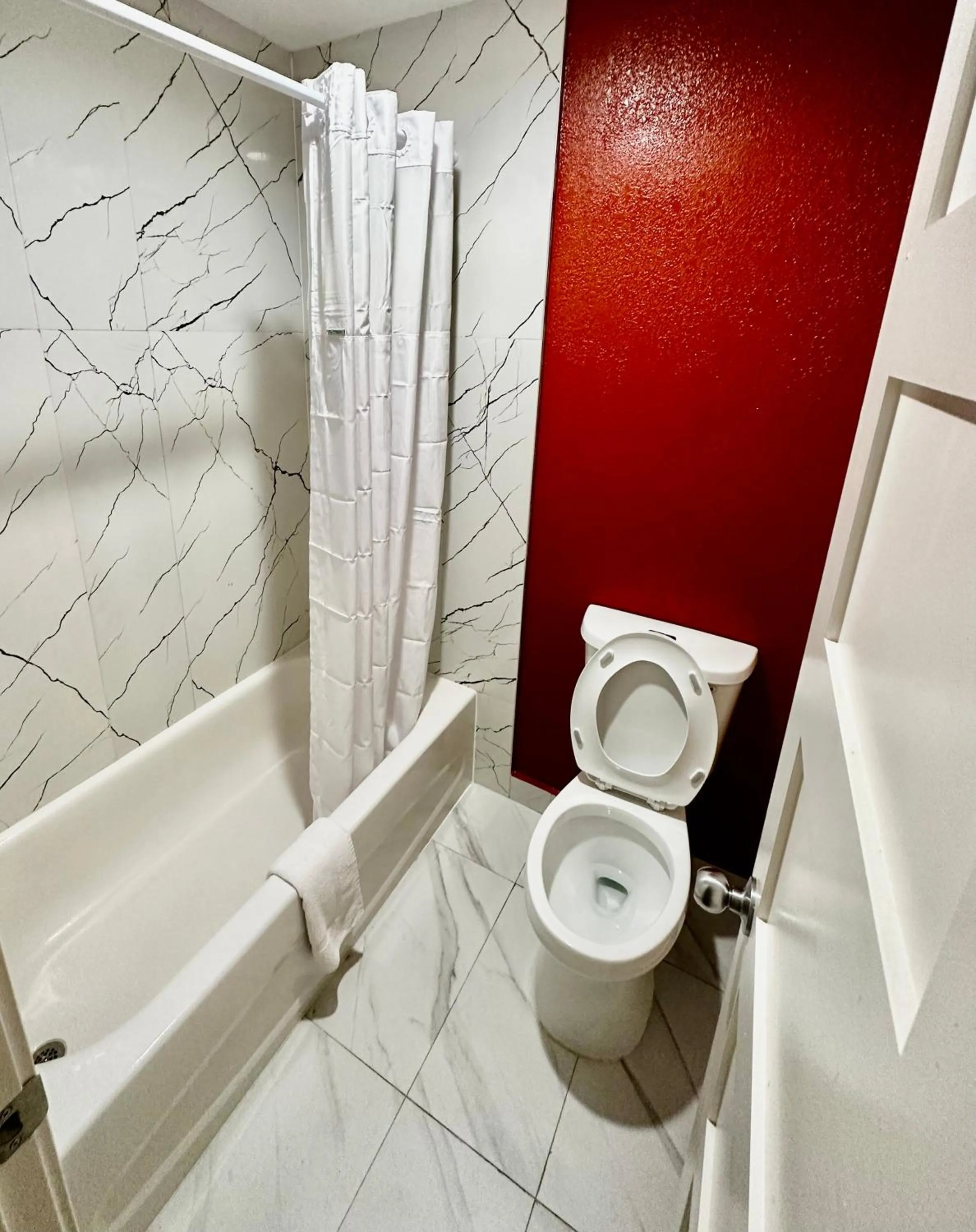 Toilet in Hollywood INN - Downtown Houston