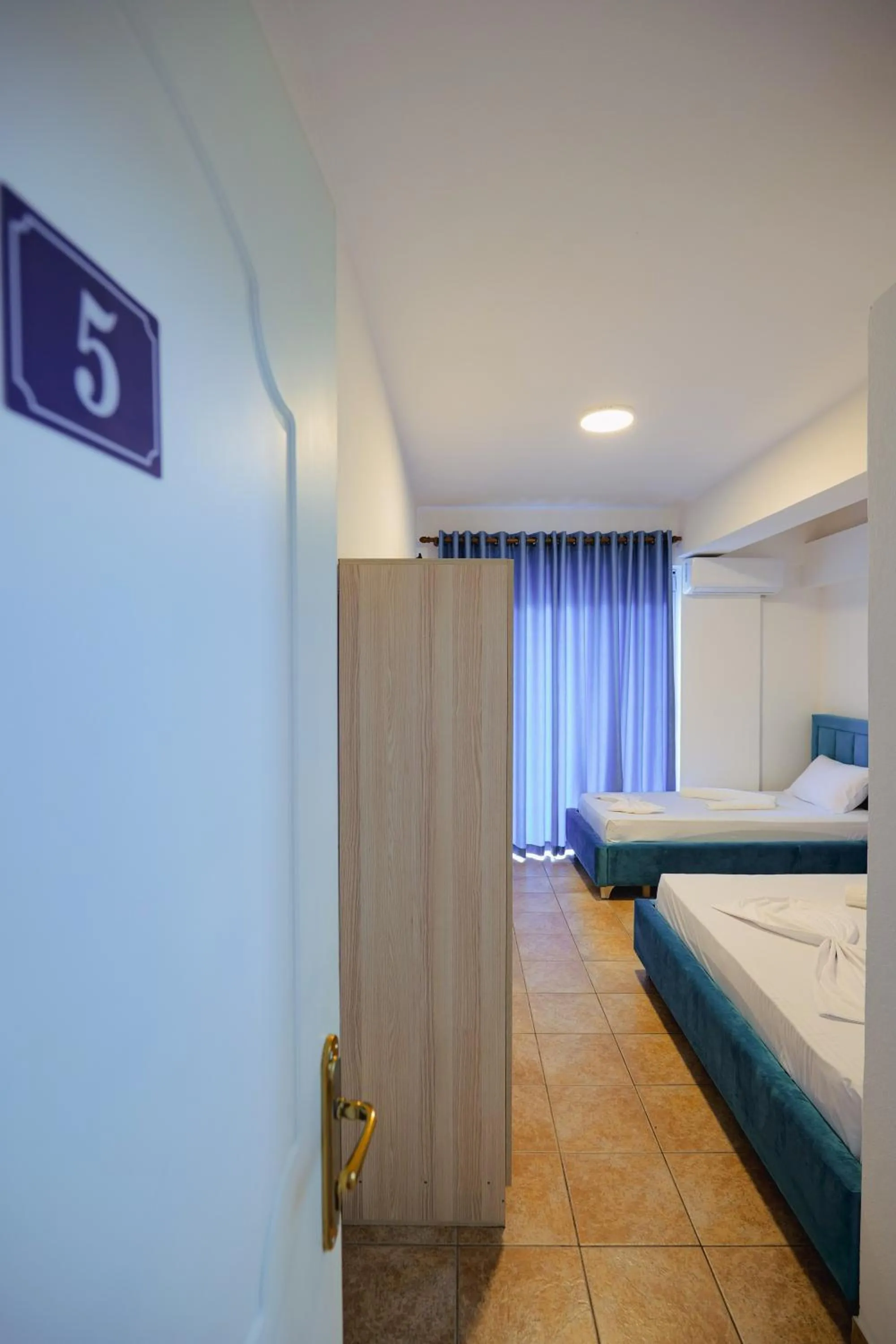 Bedroom in Mema Rooms