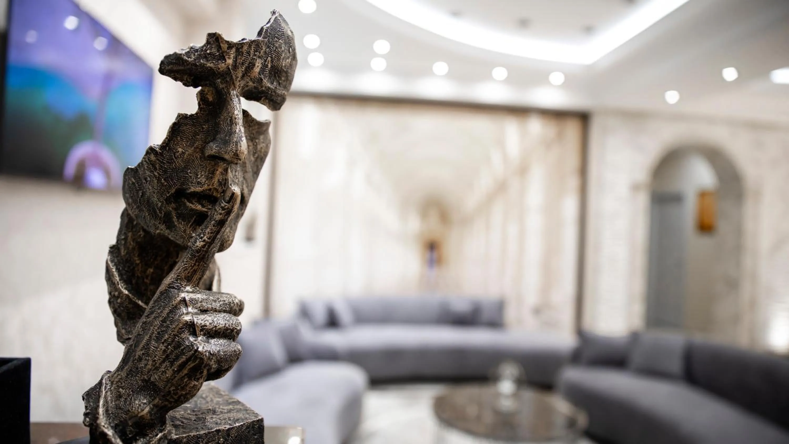 Communal lounge/ TV room in Essam Deluxe Hotel