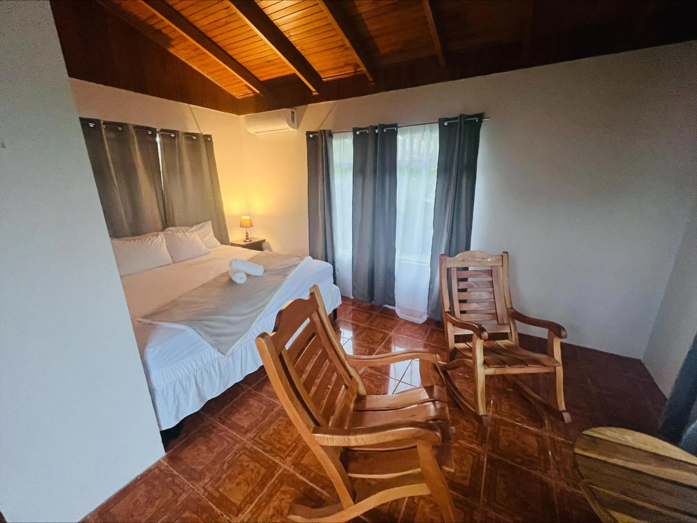 Seating area, Bed in Chateau Arenal Hotel & Restaurante