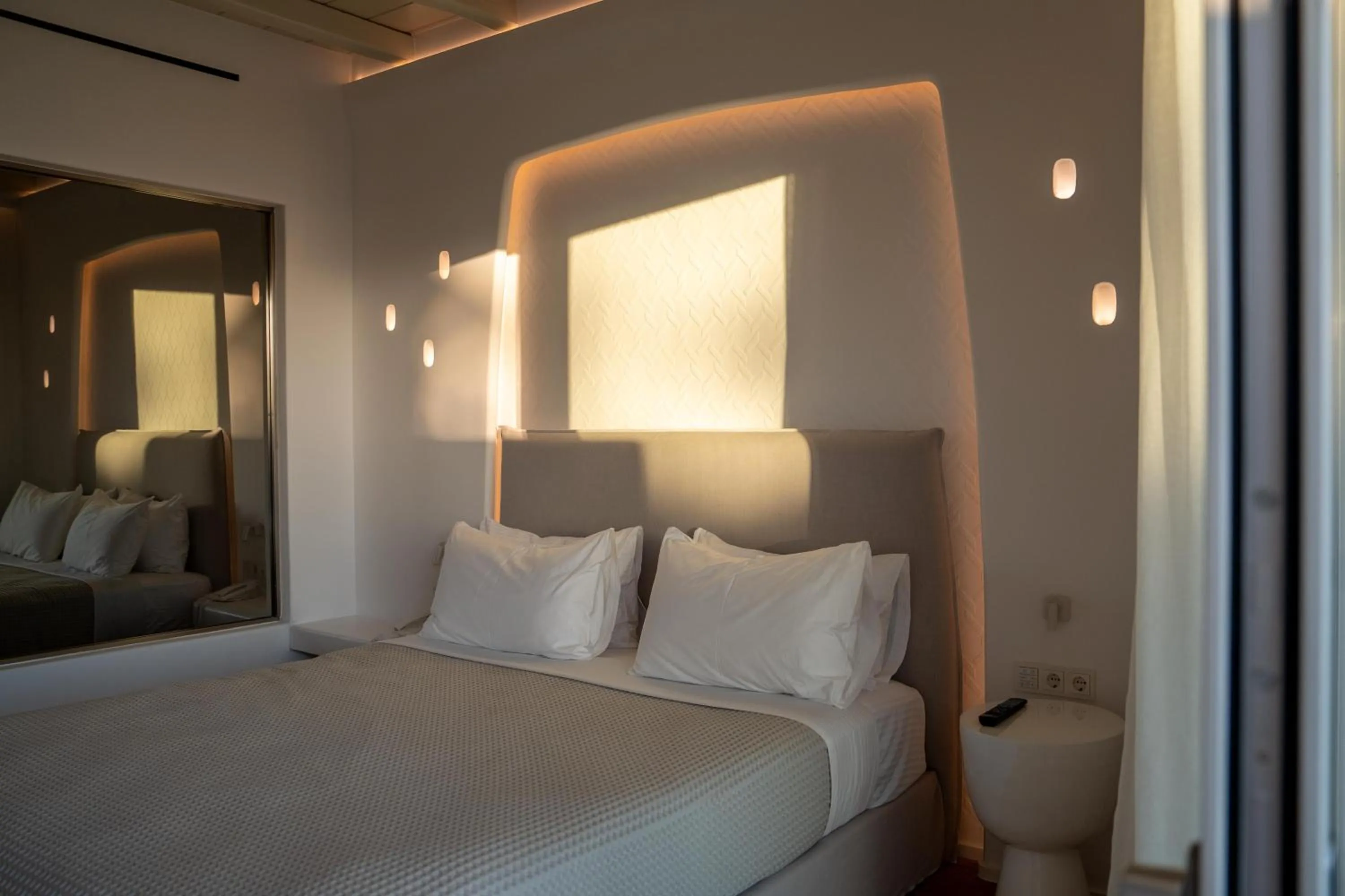 Bed in Nomia Sunset Suites Mykonos