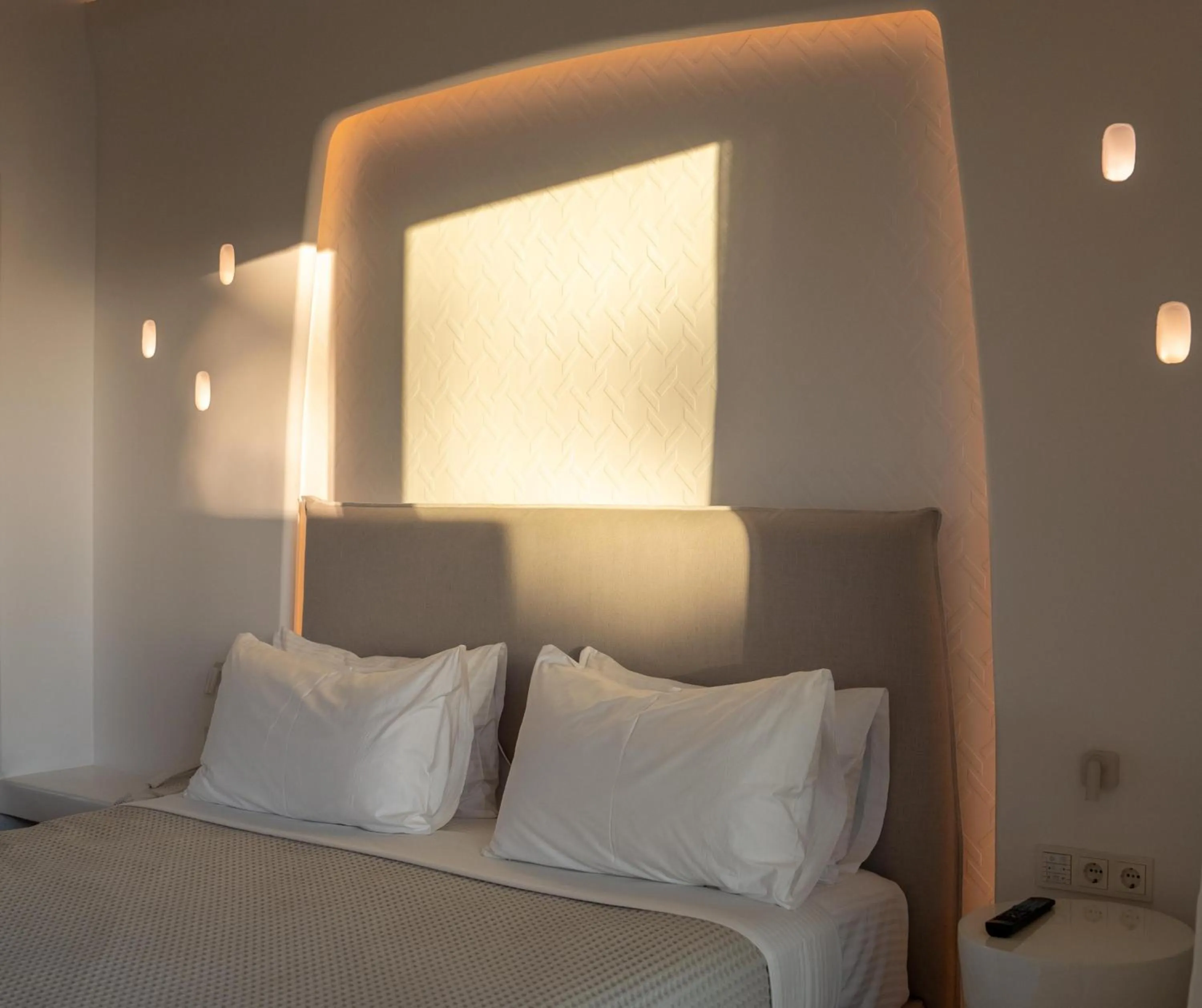 Bed in Nomia Sunset Suites Mykonos