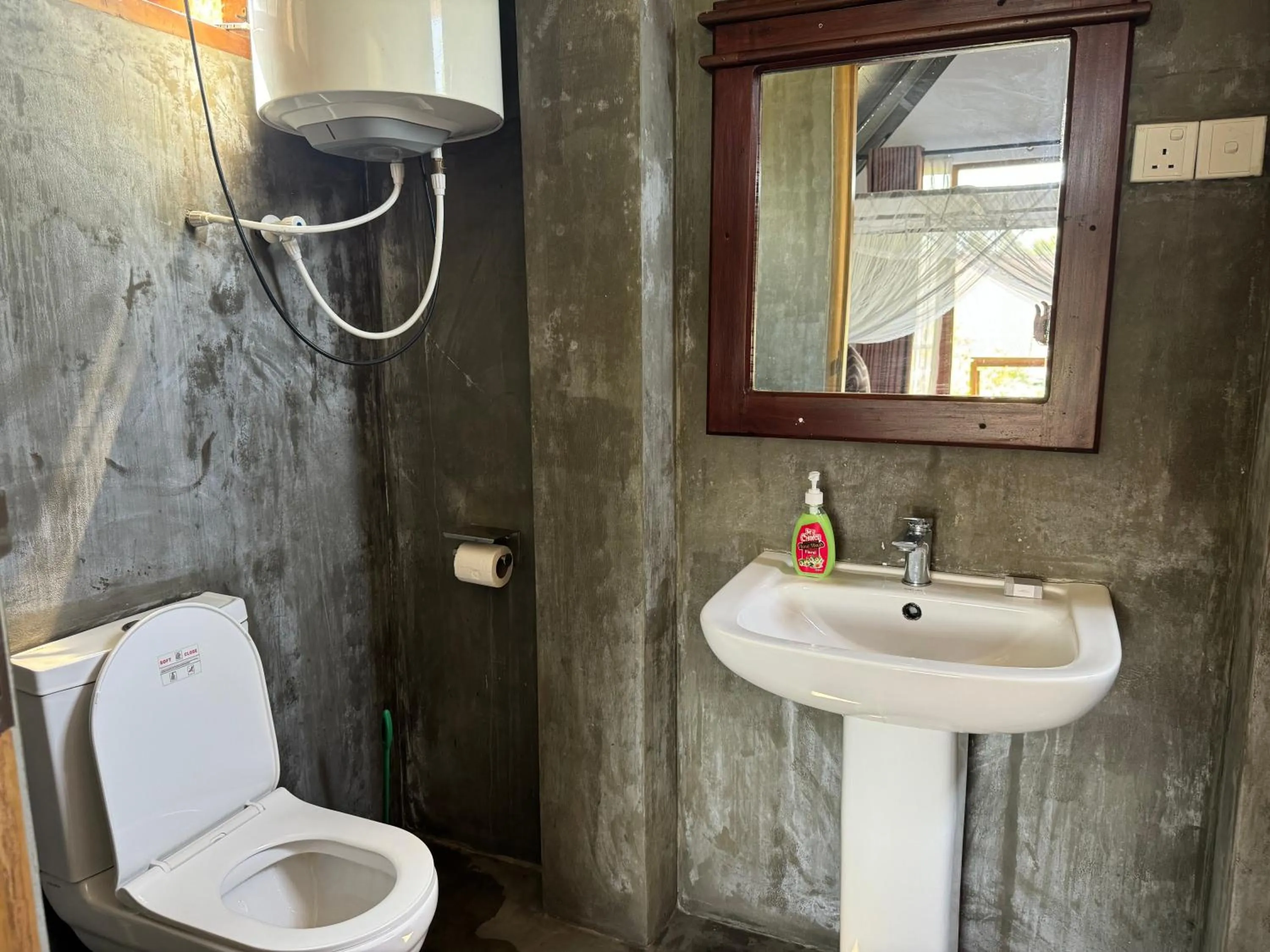 Toilet in Steps Garden Resort