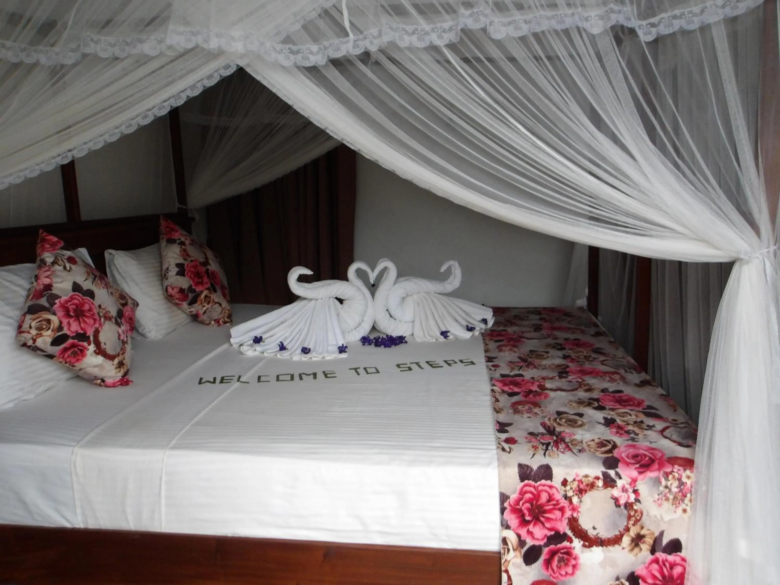 Bed in Steps Garden Resort