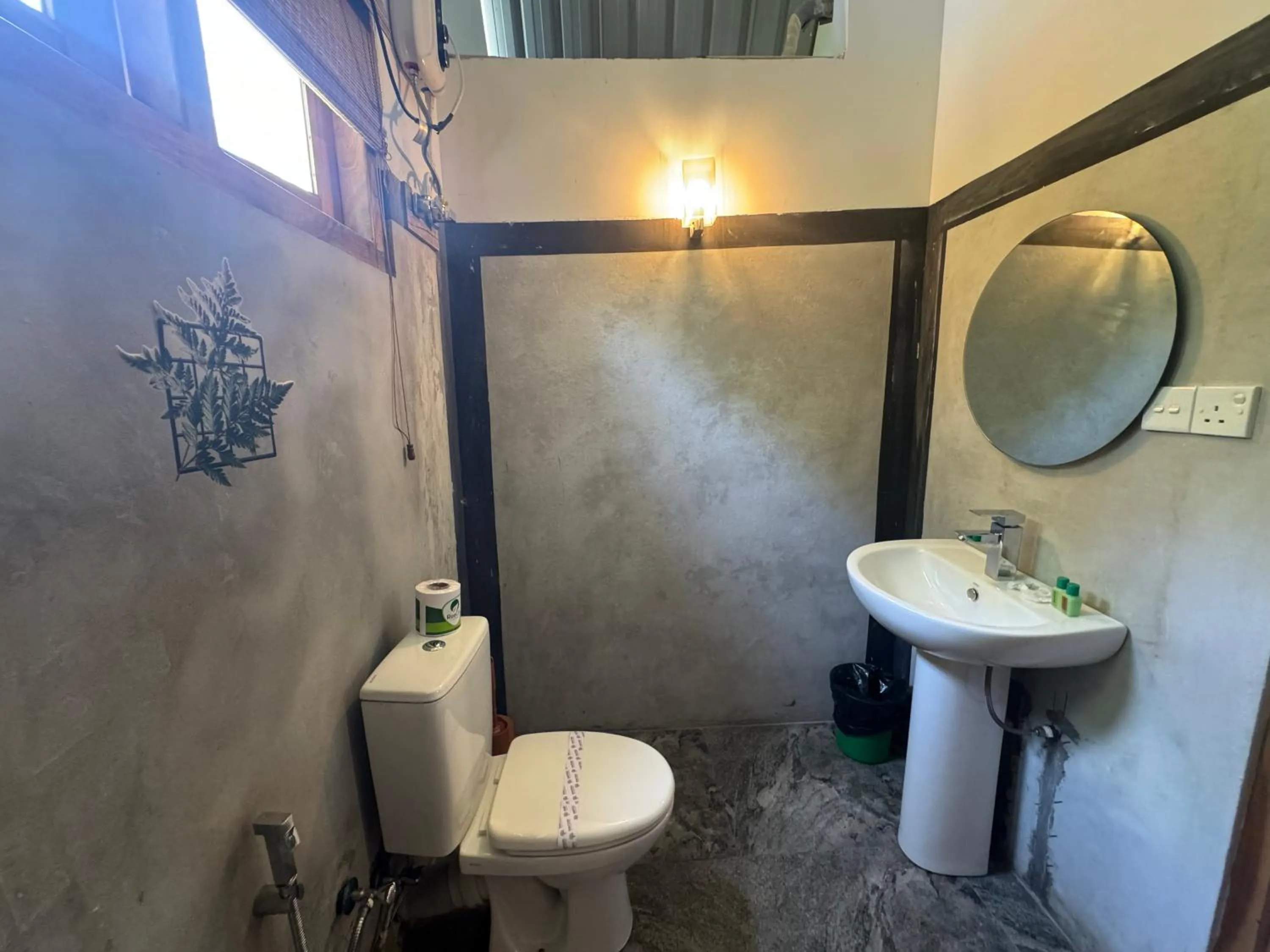 Toilet in Steps Garden Resort