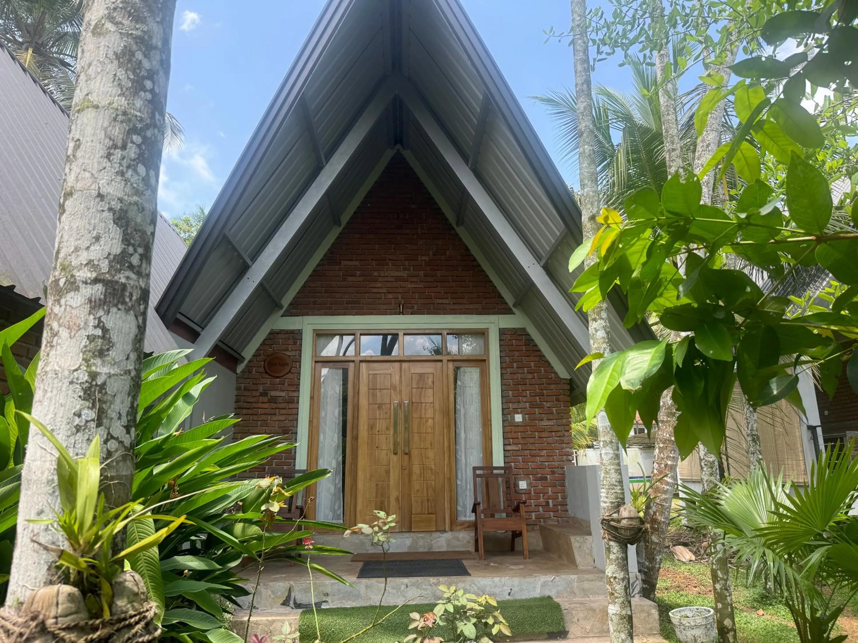 Facade/entrance in Steps Garden Resort
