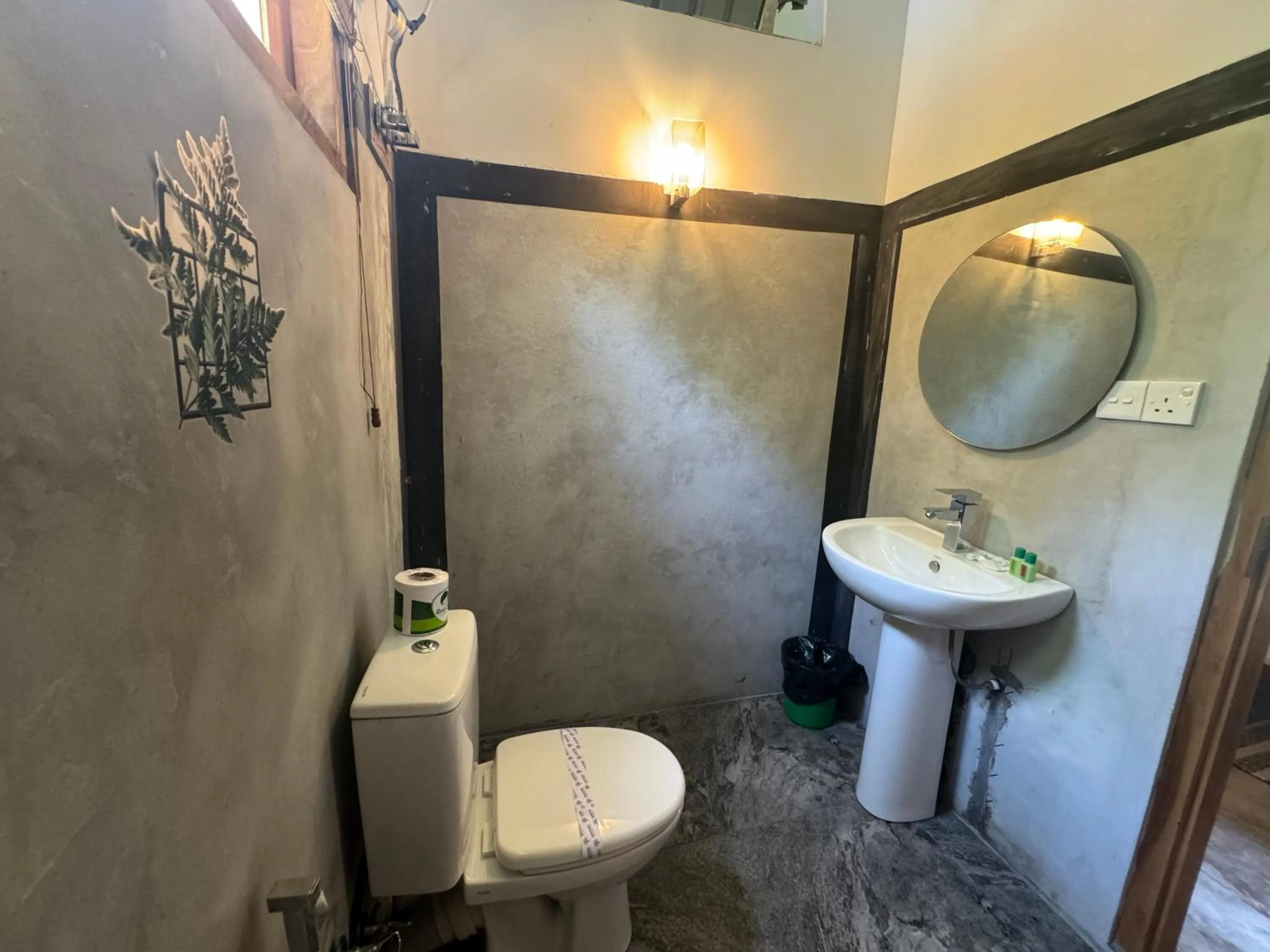 Toilet in Steps Garden Resort