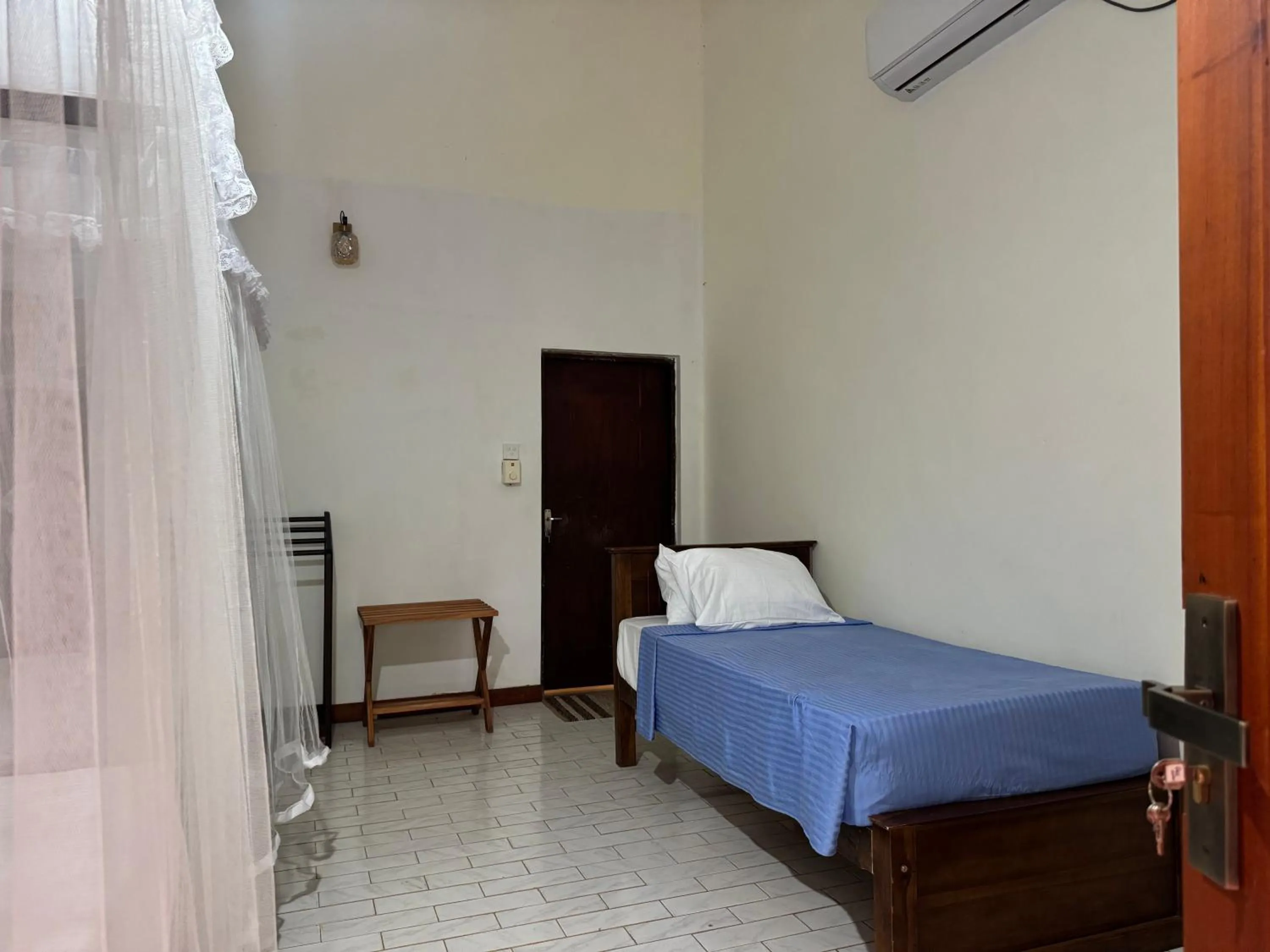 Bed in Steps Garden Resort