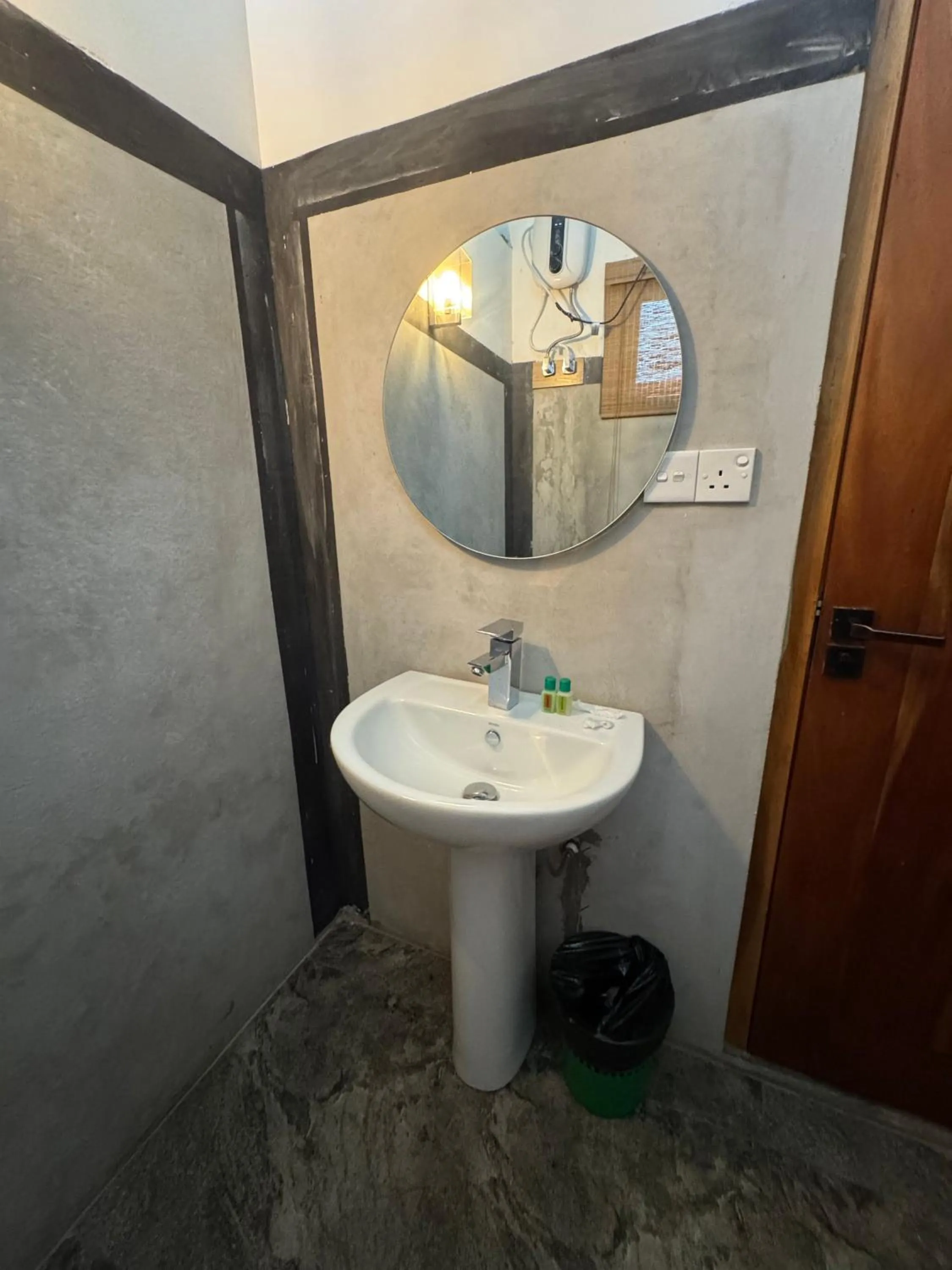 Bathroom in Steps Garden Resort