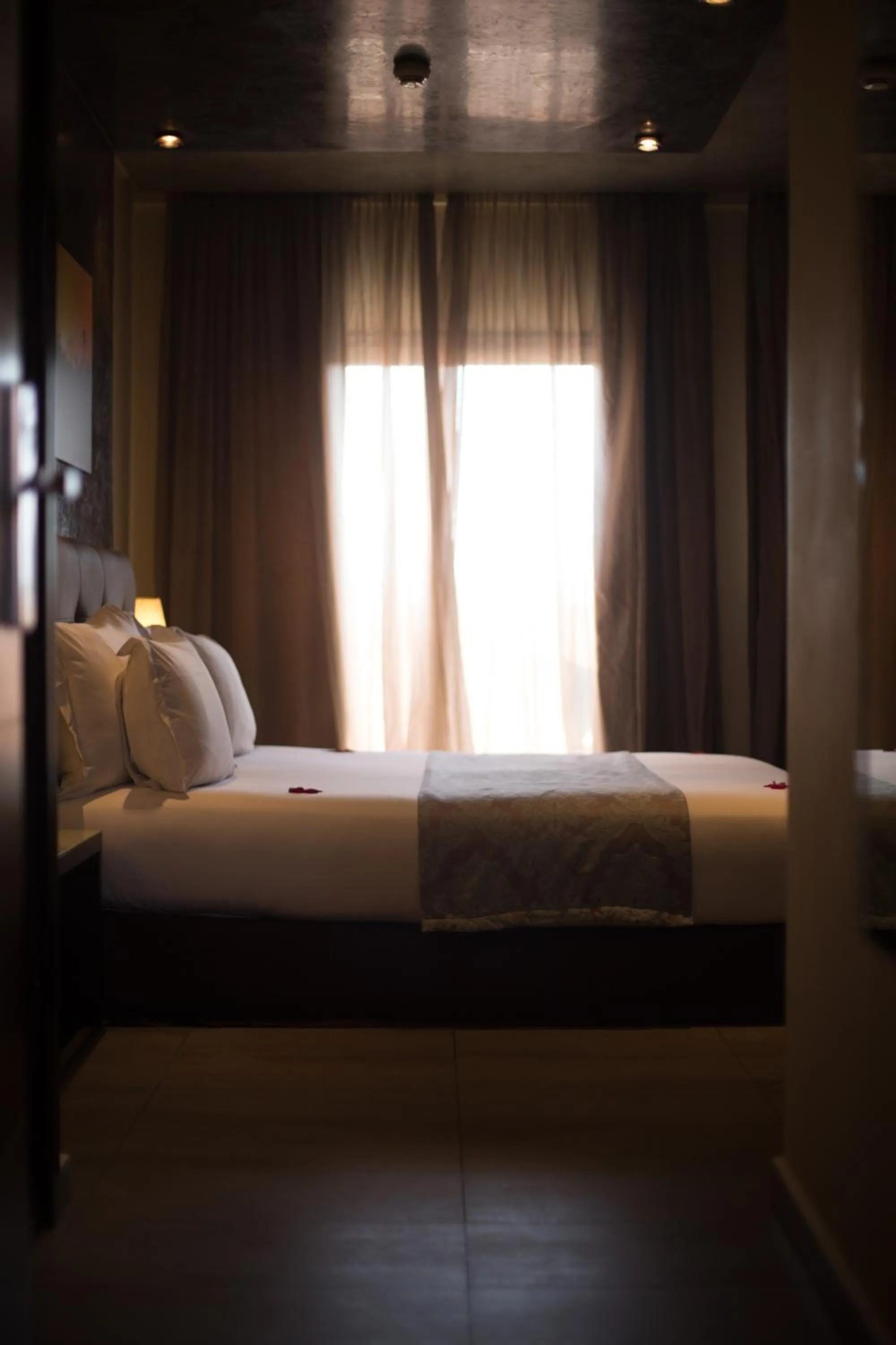 Bed in Dellarosa Boutique Hotel and Spa