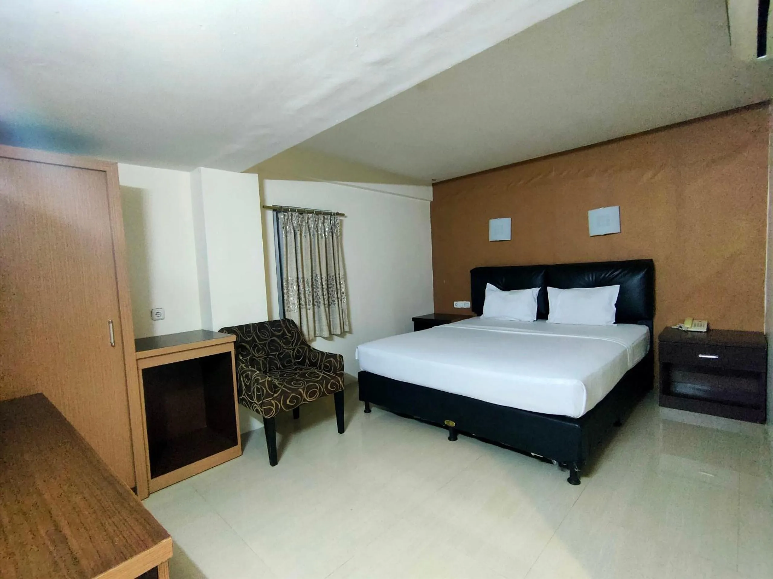 Bedroom in Hotel O Hasma Jaya Syariah