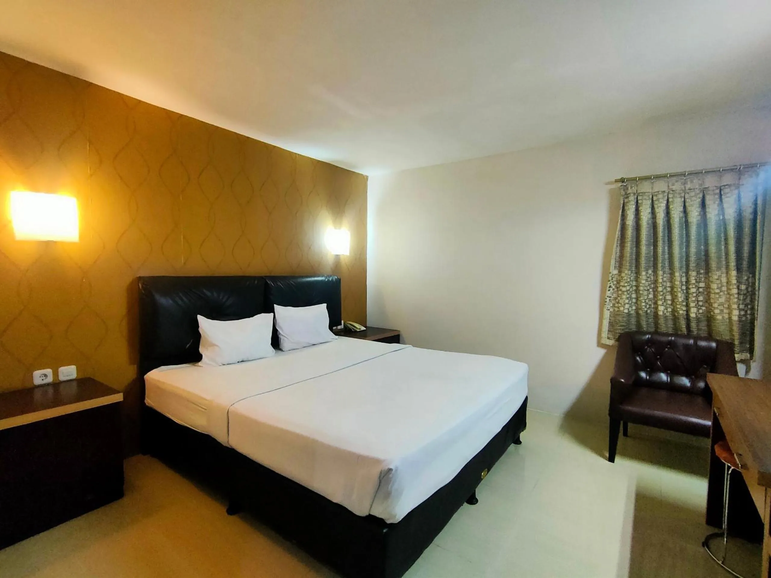 Bedroom in Hotel O Hasma Jaya Syariah