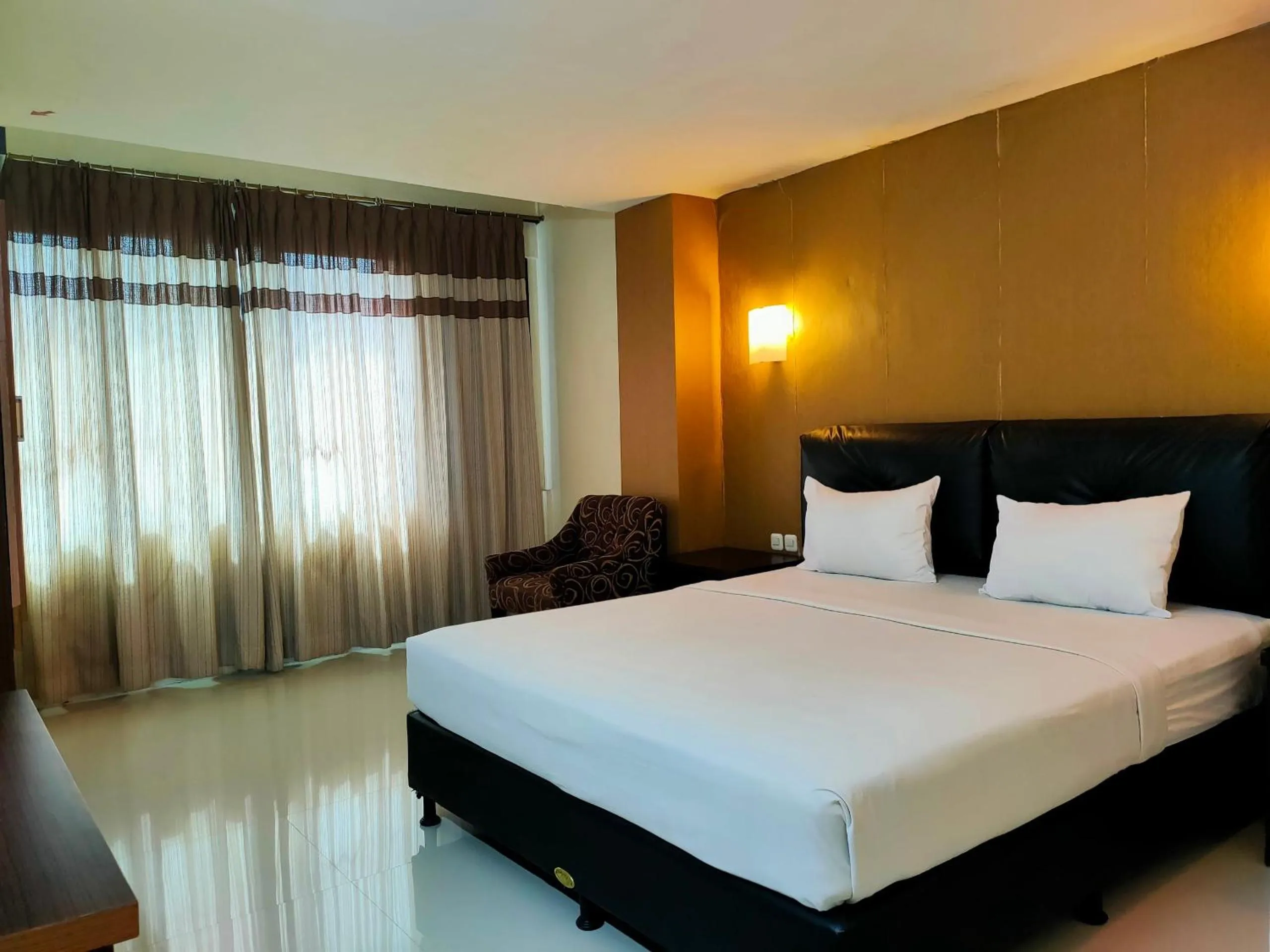 Bedroom in Hotel O Hasma Jaya Syariah