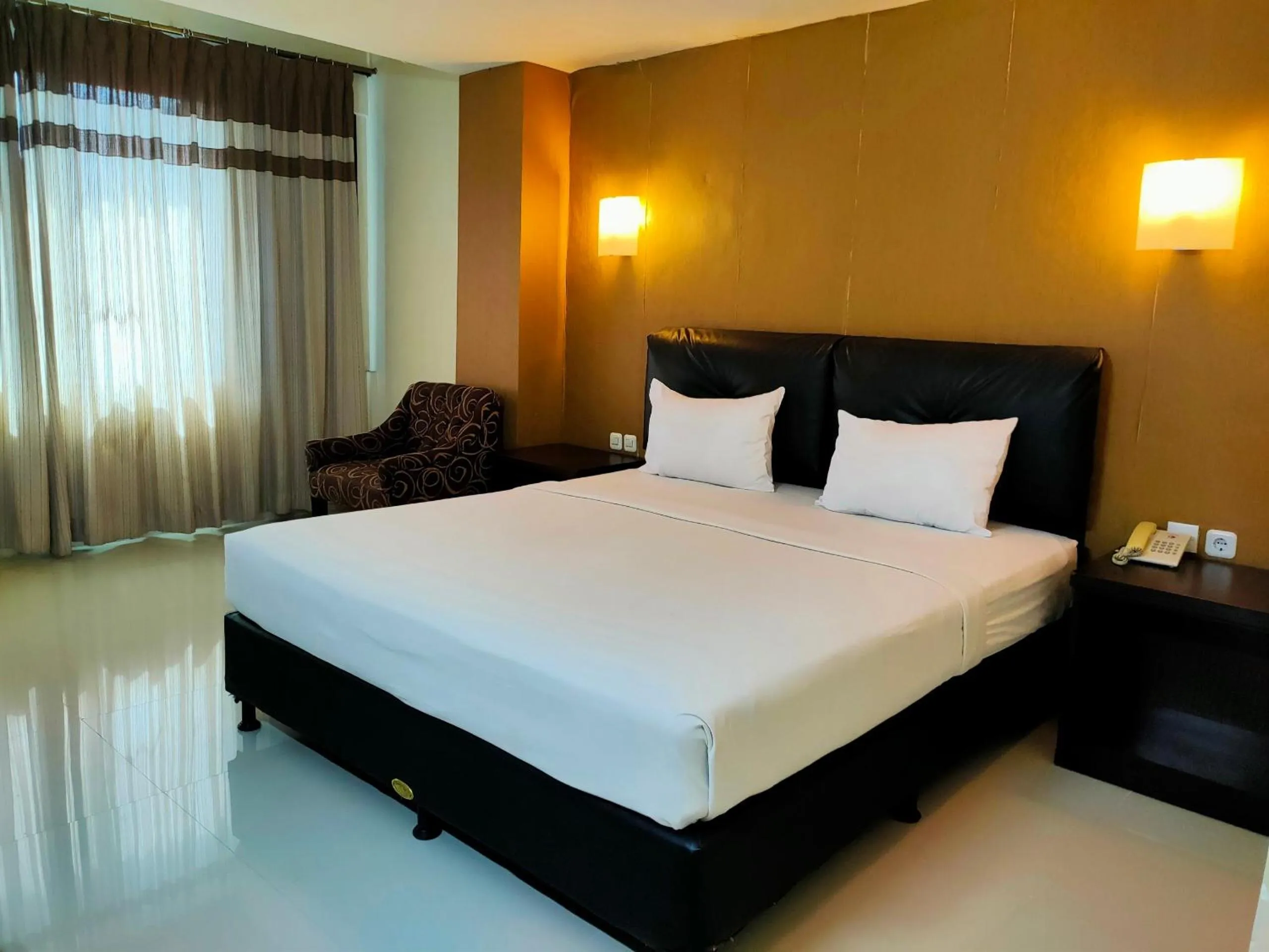 Bedroom in Hotel O Hasma Jaya Syariah