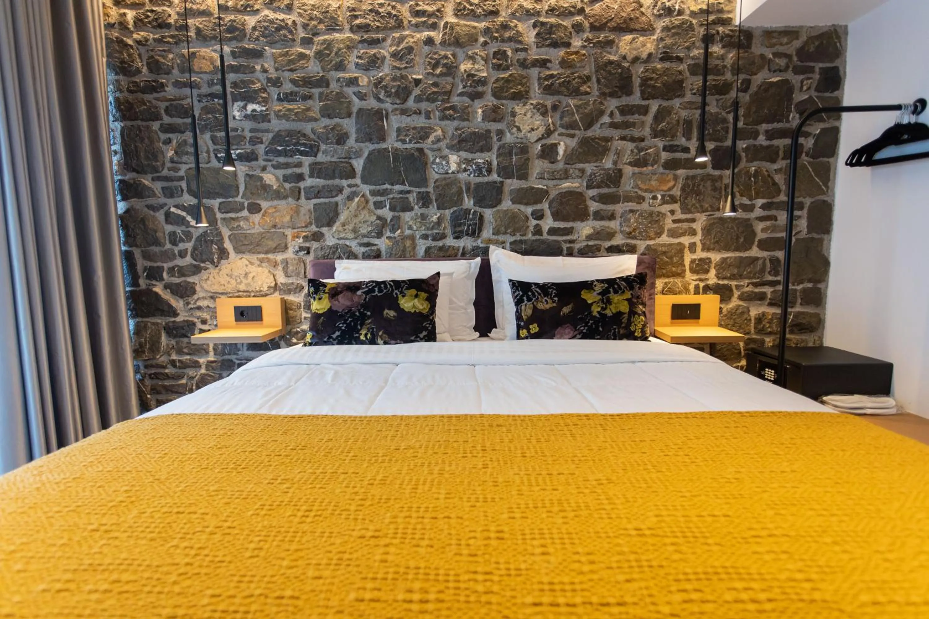 Bed in Opal Executive Suites