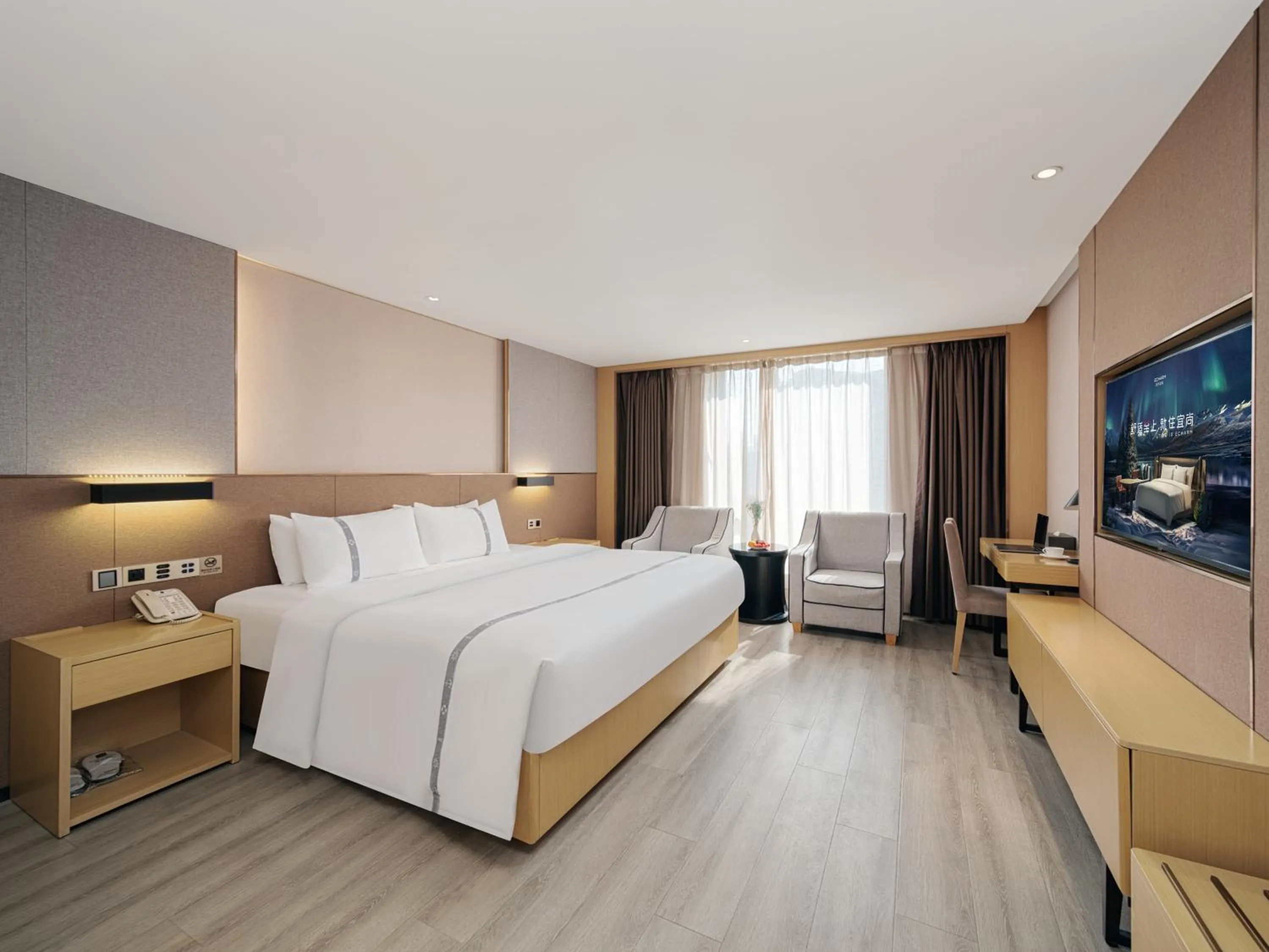 Communal lounge/ TV room, Bed in Yishang Hotel - Guangzhou Railway Station Yuexiu Park Subway Station