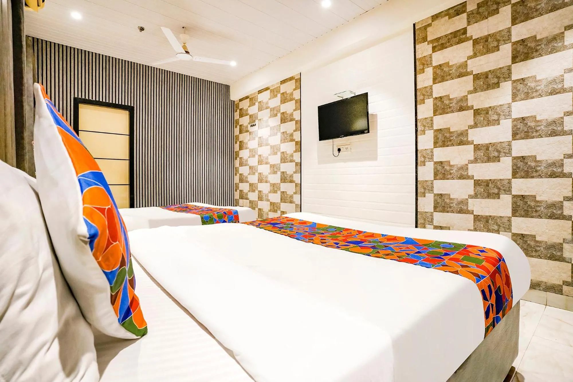 Bed in FabHotel Prime Welcome Palace - Inside Chandni Chowk Complex
