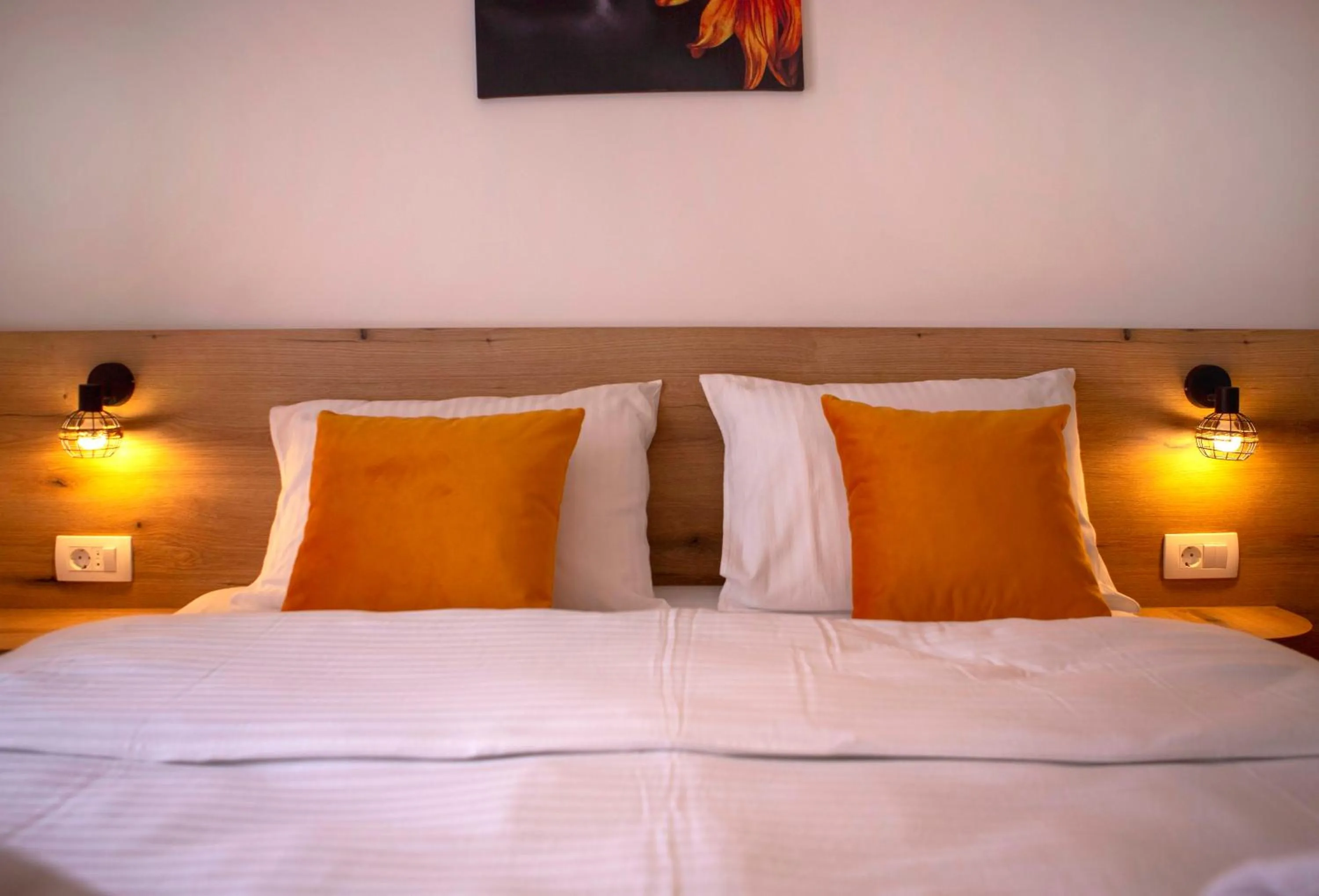 Bed in Pini Apart-hotel