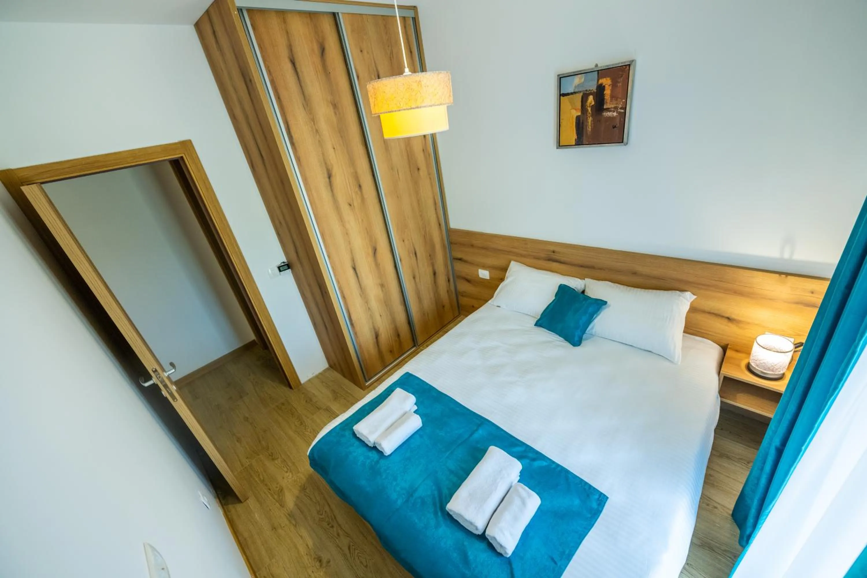 View (from property/room), Bed in Pini Apart-hotel