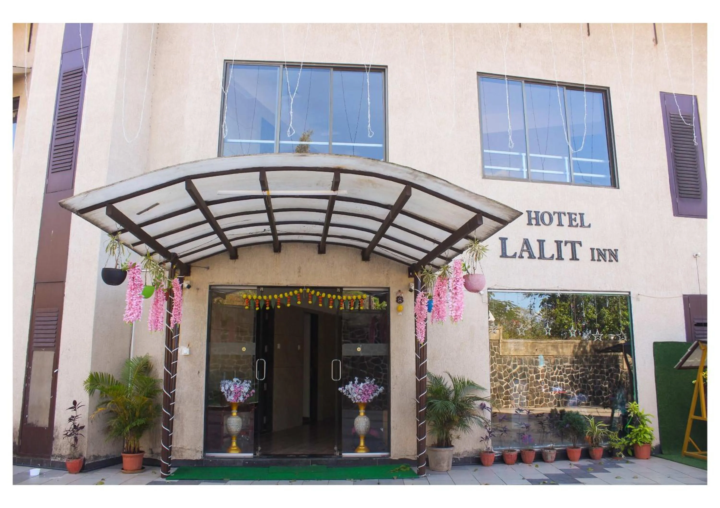 Property building in Hotel Lalit inn